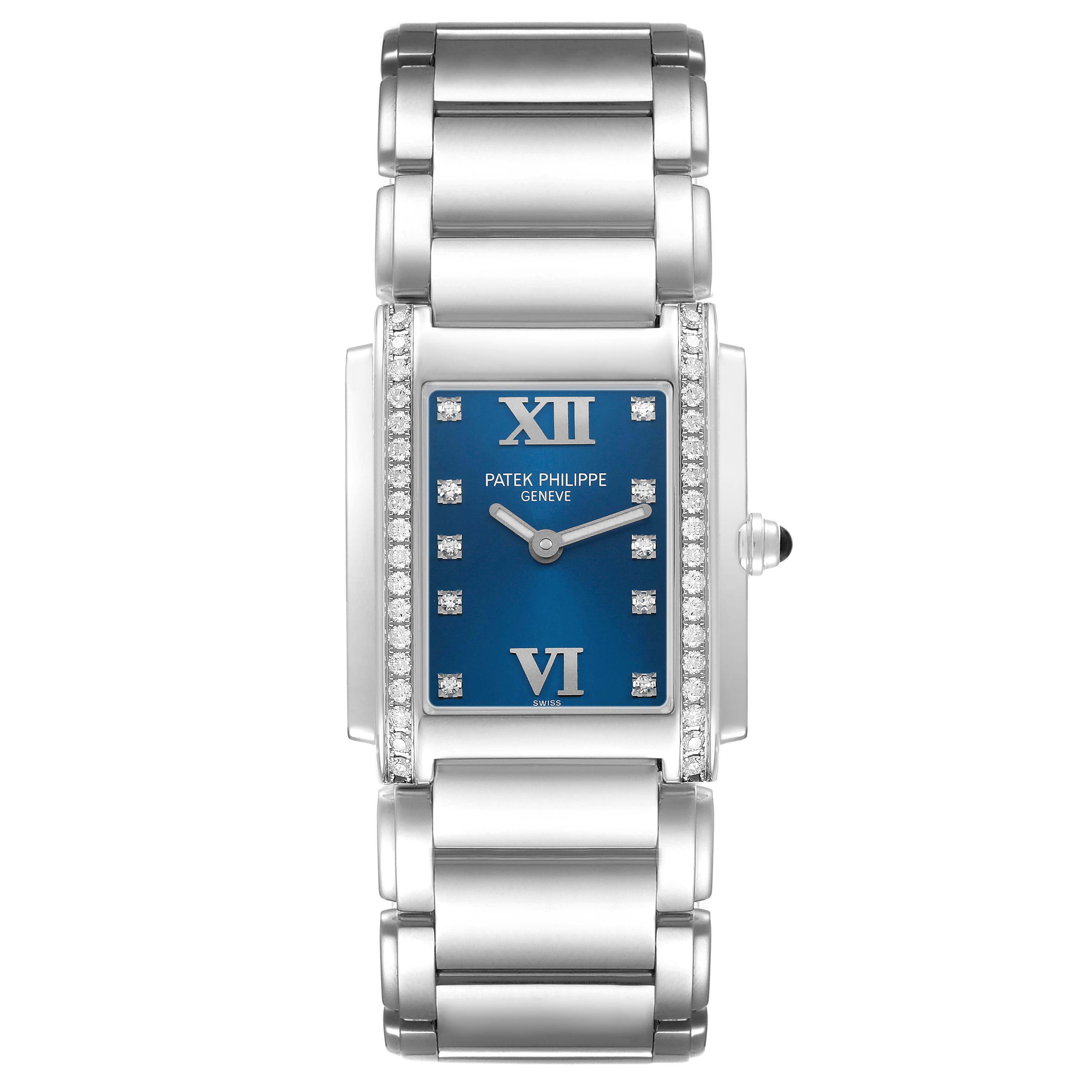 The Patek Philippe Twenty-4 4910 4910A Women's Stainless Steel Blue Dial watch is shown from a top-down angle, highlighting the blue dial, diamond markers, and metal bracelet.