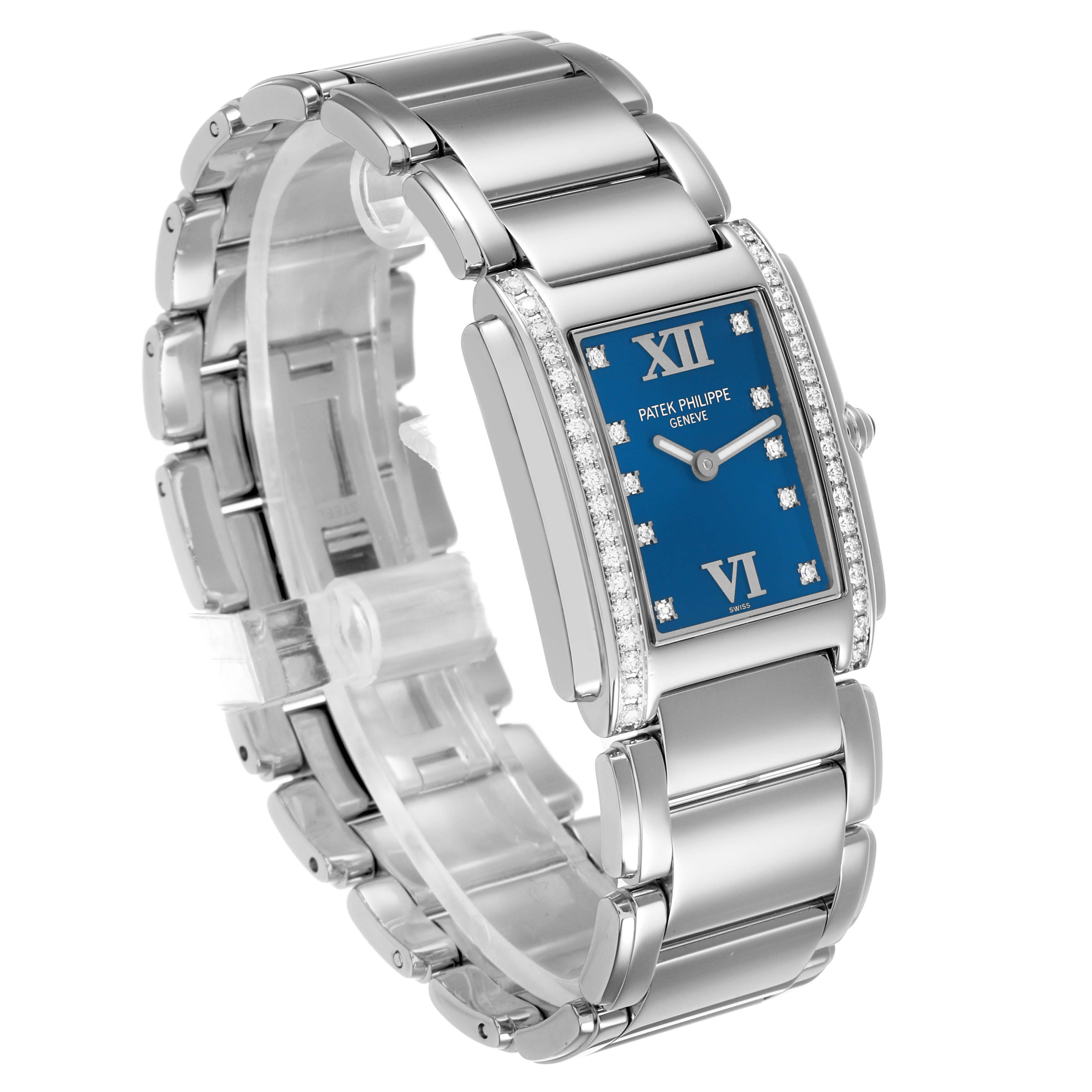 The Patek Philippe Twenty-4 4910 4910A Women's Stainless Steel Blue Dial watch is shown at a three-quarter angle, highlighting its blue dial, diamond bezel, and stainless steel bracelet.