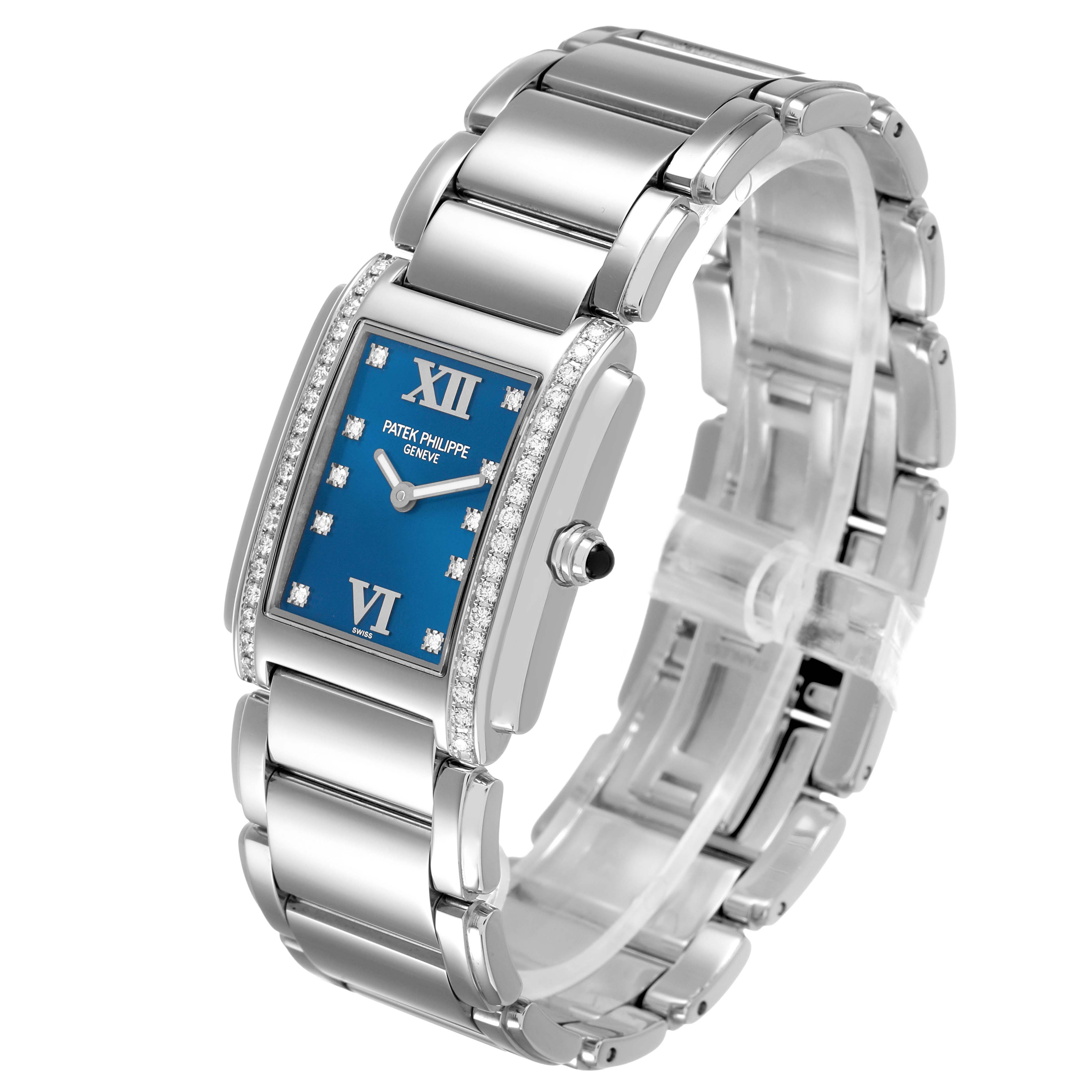 The Patek Philippe Twenty-4 4910/10A-012 Women's Stainless Steel Blue Dial watch is shown at a slight angle, displaying its blue dial, diamond bezel, and stainless steel bracelet.