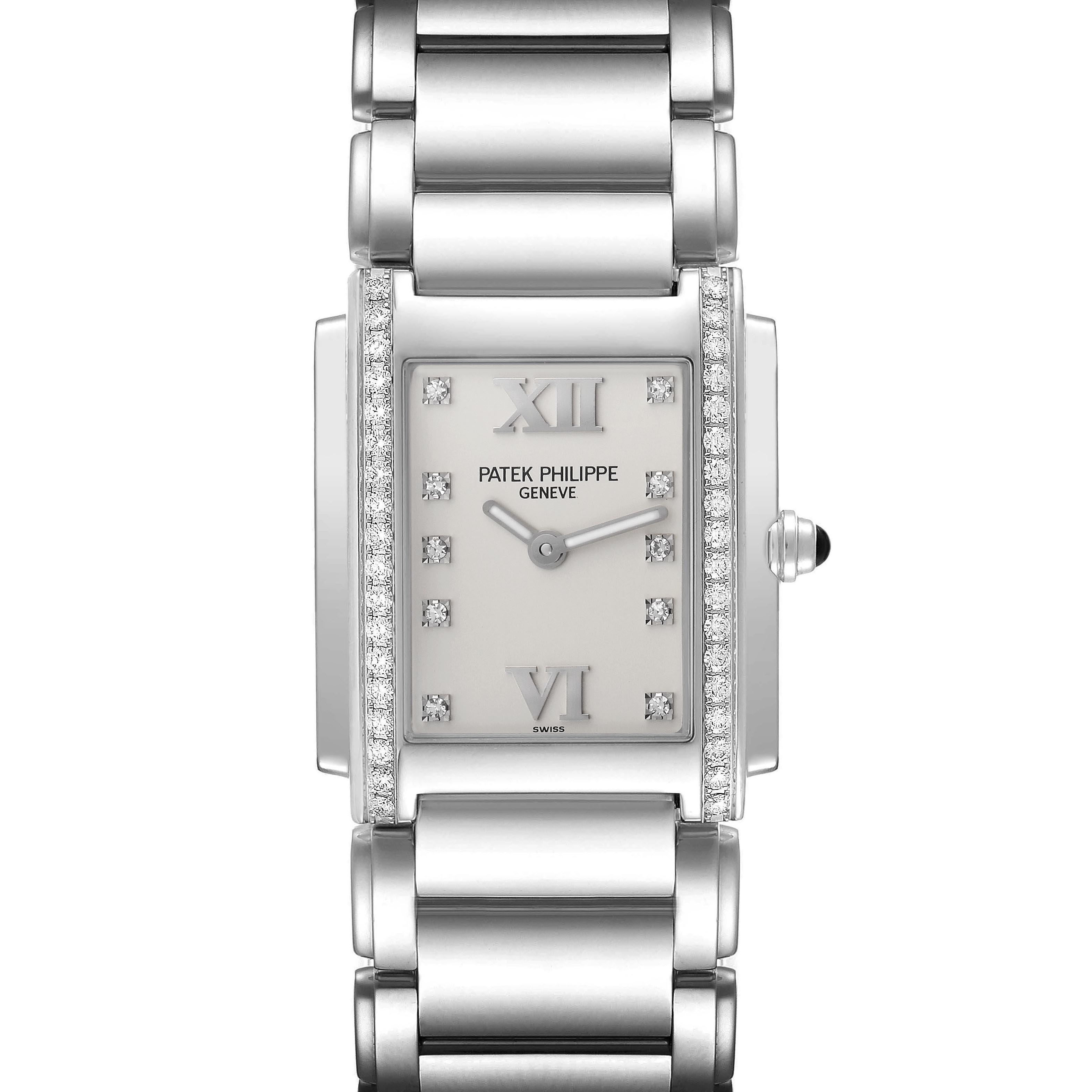The Patek Philippe Twenty-4 4910 Women
s Stainless Steel Silver Dial 4910 Women
s Stainless Steel Silver Dial watch is shown from a top view, highlighting its rectangular face, diamond accents, and bracelet.