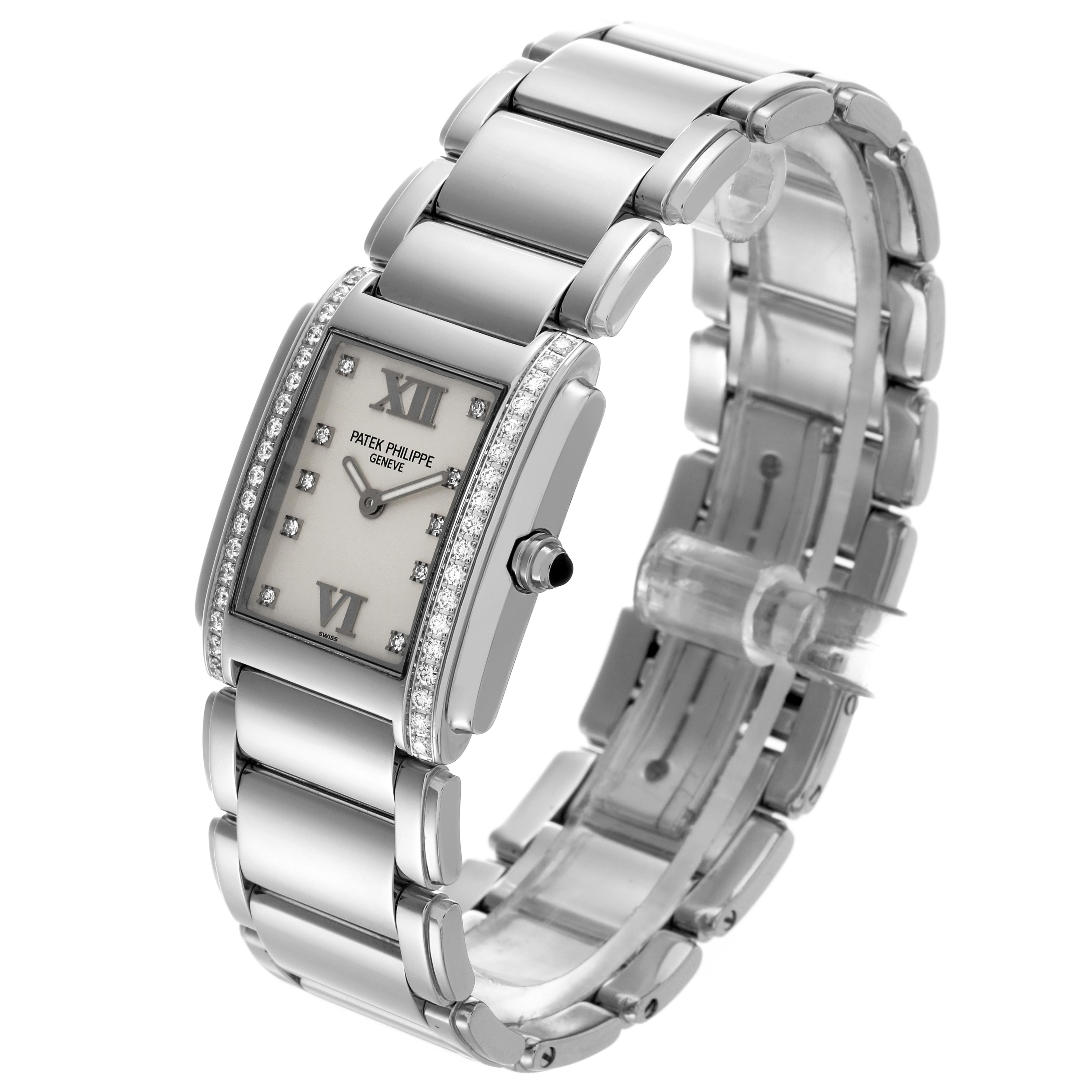 The Patek Philippe Twenty-4 4910 Women
s Stainless Steel Silver Dial 4910 Women
s Stainless Steel Silver Dial watch is shown at a three-quarter angle, displaying the face, crown, and bracelet.