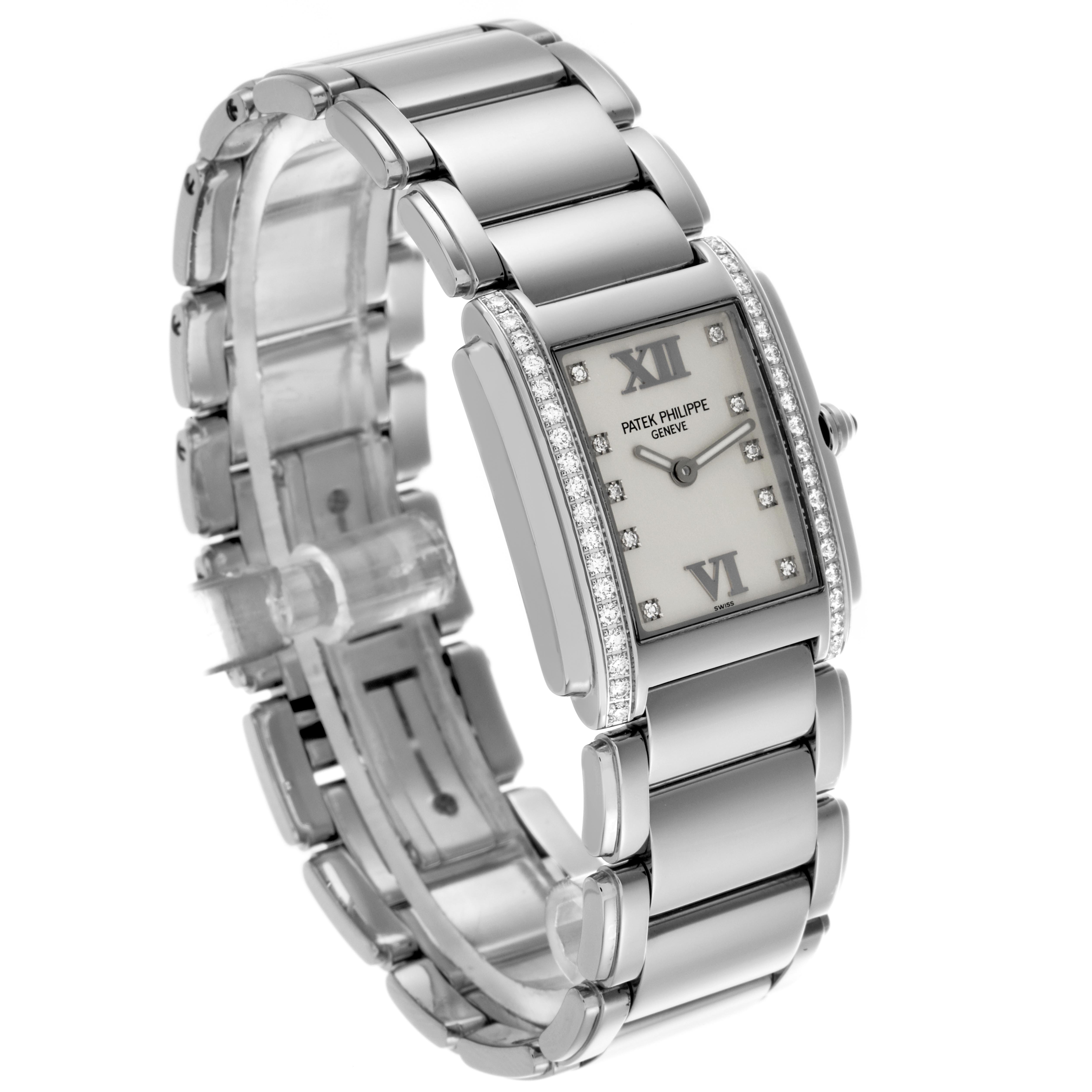 The Patek Philippe Twenty-4 4910 Women
s Stainless Steel Silver Dial 4910 Women
s Stainless Steel Silver Dial watch is shown at a three-quarter angle highlighting the face, bezel, and bracelet.