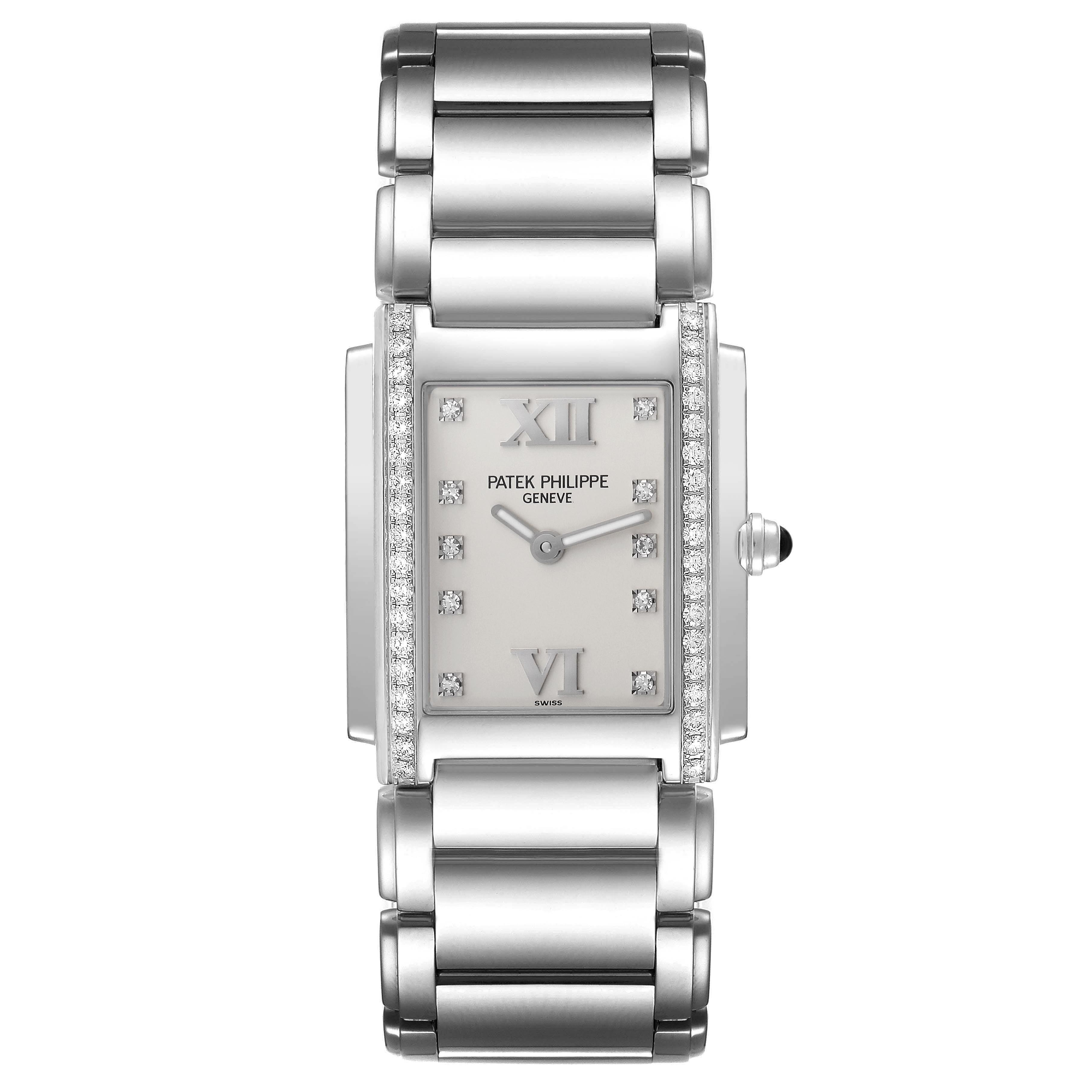 The Patek Philippe Twenty-4 4910 Women
s Stainless Steel Silver Dial 4910 Women
s Stainless Steel Silver Dial watch is shown from a top-down angle, highlighting the rectangular face, diamond markers, and metal bracelet.