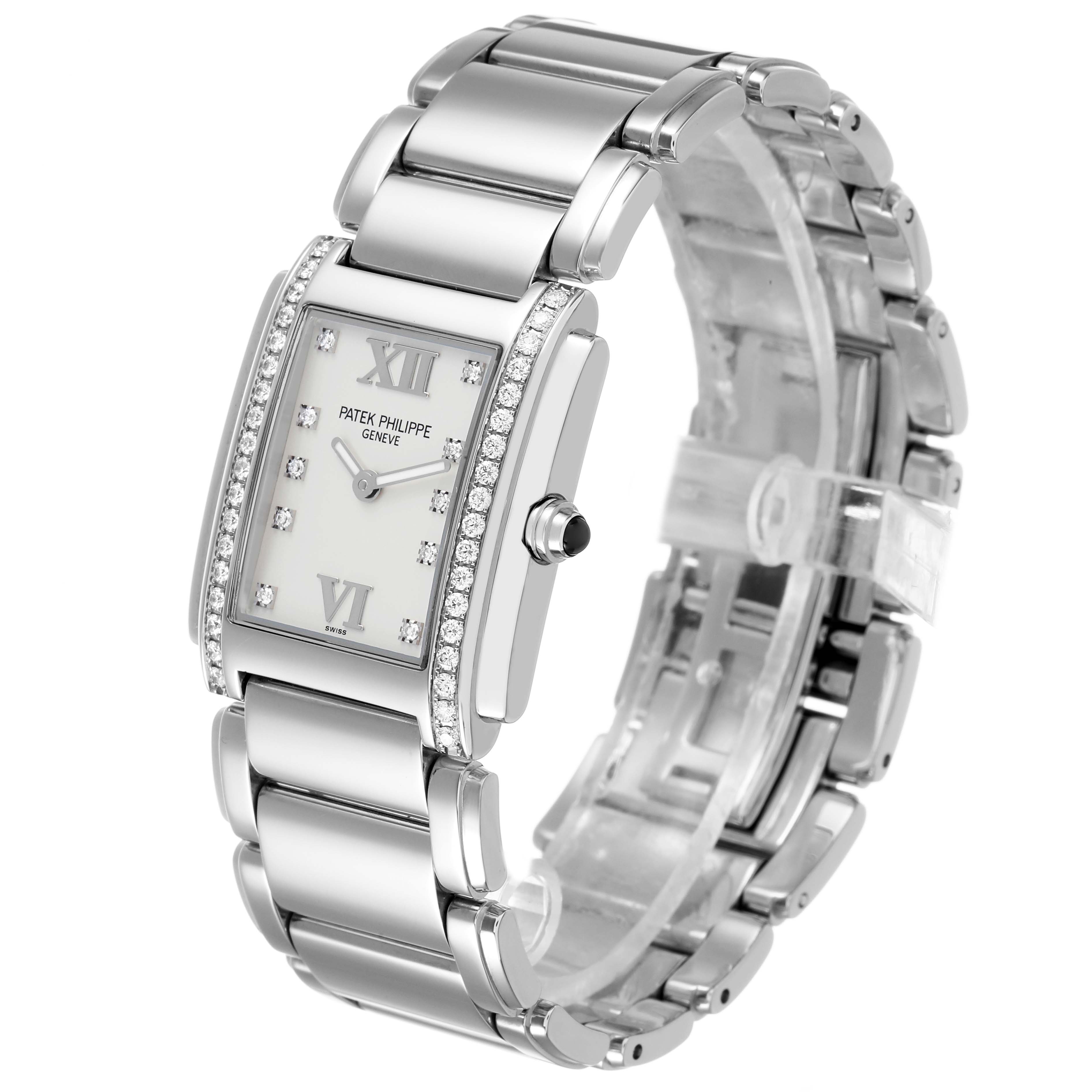 The Patek Philippe Twenty-4 4910/10A-011 Women's Stainless Steel Silver Dial watch is shown at a three-quarter angle, displaying the face, bracelet, and side detailing.
