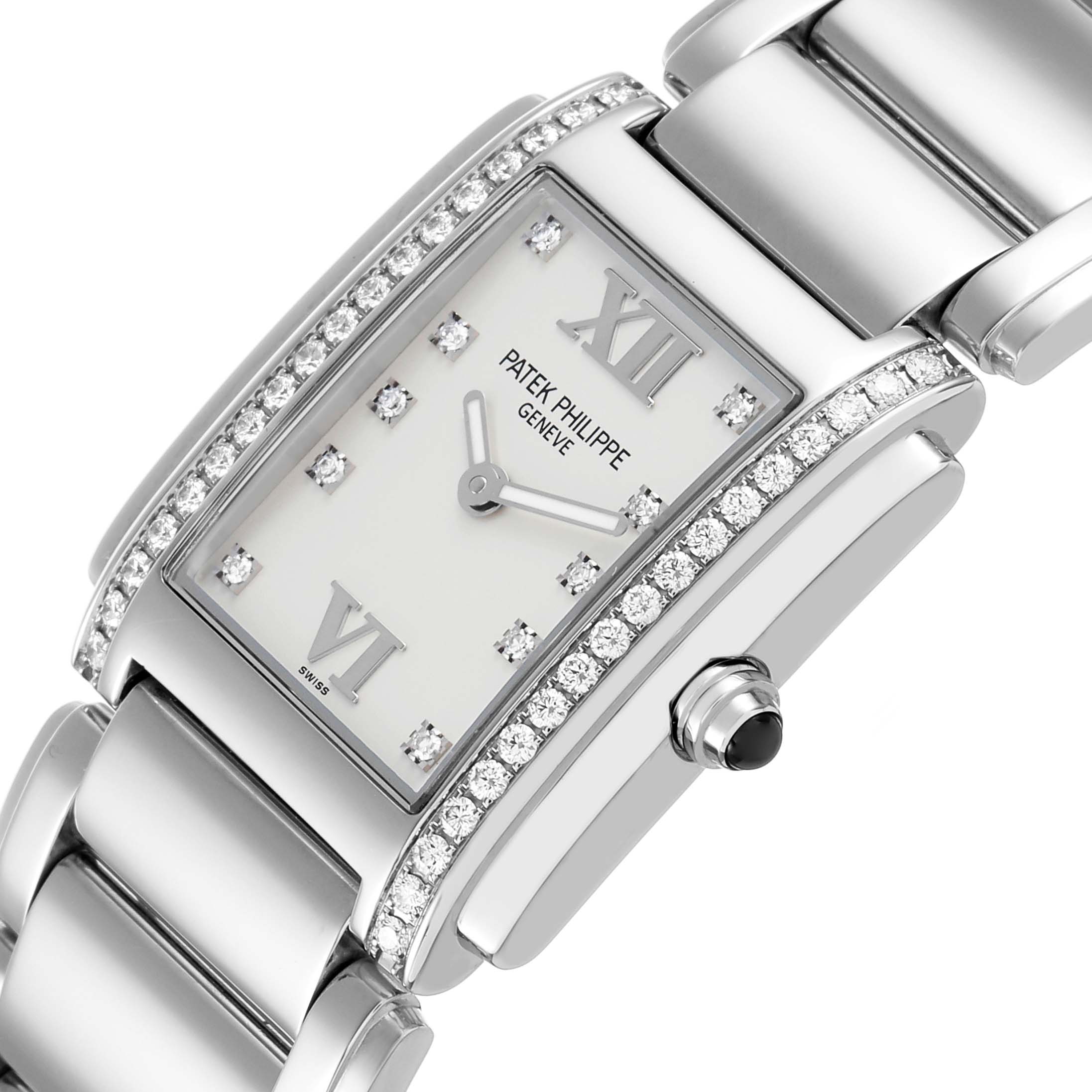 The Patek Philippe Twenty-4 4910/10A-011 Women's Stainless Steel Silver Dial watch is shown at an angle displaying the face, diamond-encrusted bezel, and part of the bracelet.