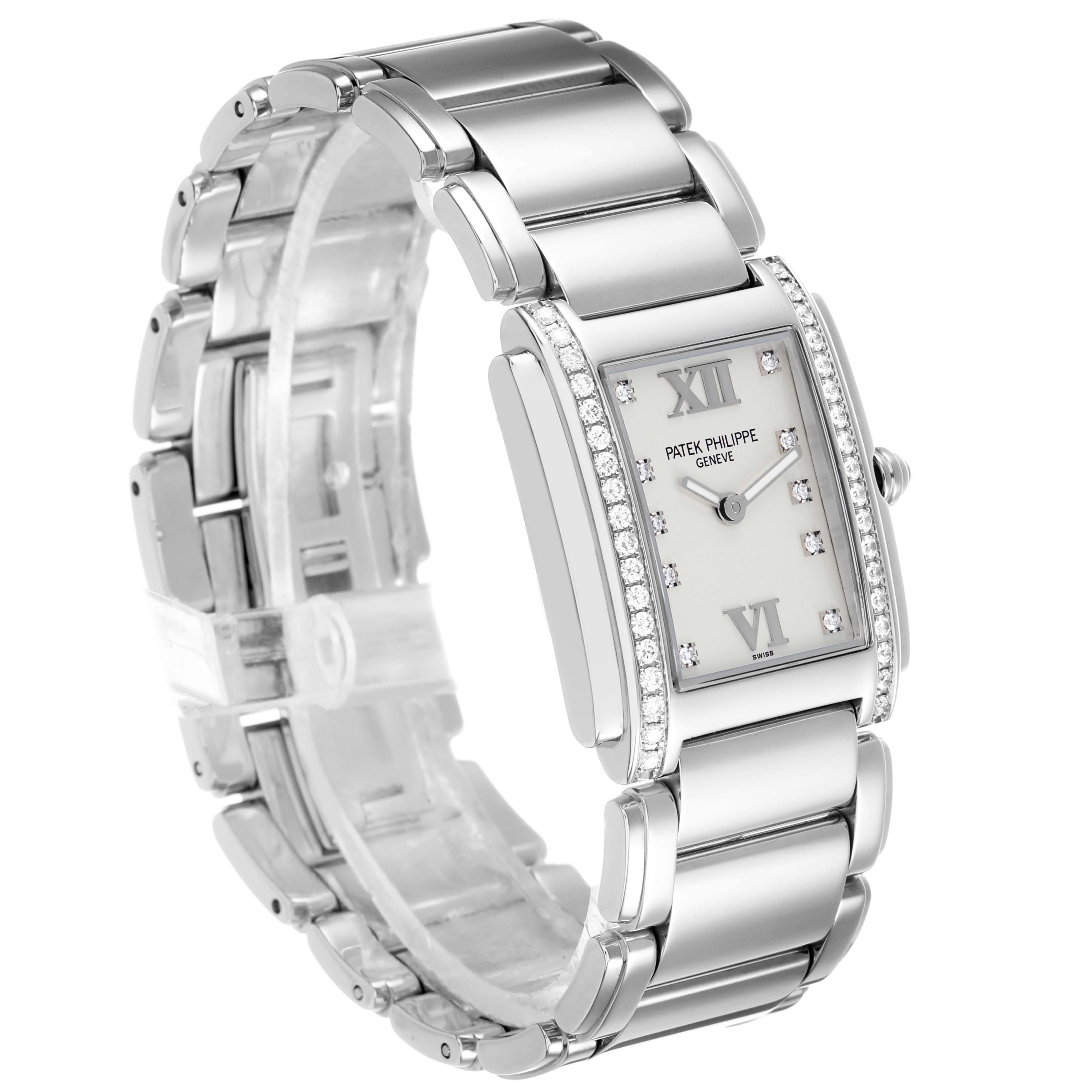 The Patek Philippe Twenty-4 4910/10A-011 Women's Stainless Steel Silver Dial watch is shown at a three-quarter angle, highlighting the face, diamond bezel, and metal bracelet.