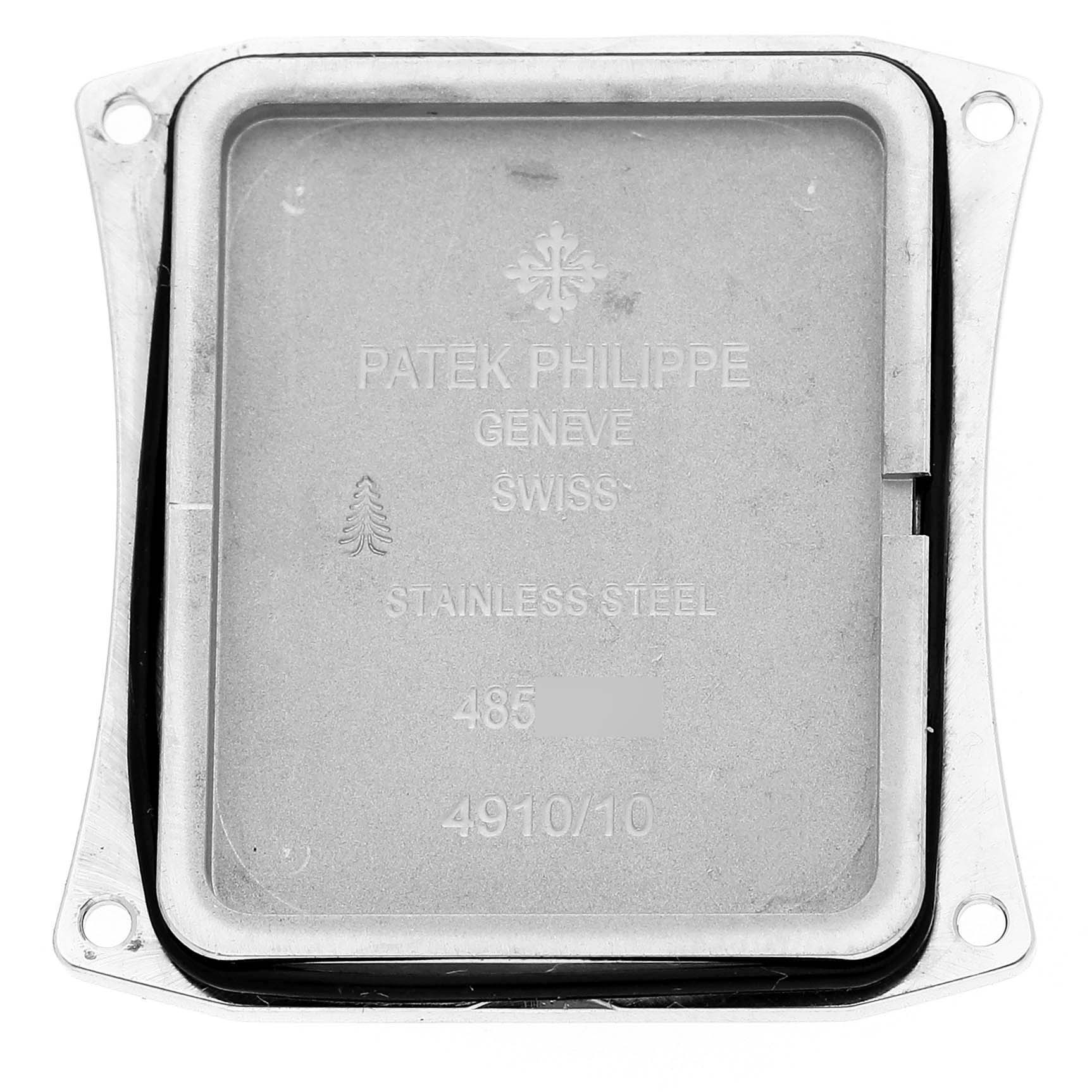 The image shows the back cover of a Patek Philippe Twenty-4 4910/10A-011 Women's Stainless Steel Silver Dial watch, highlighting the brand's engraving and material details.