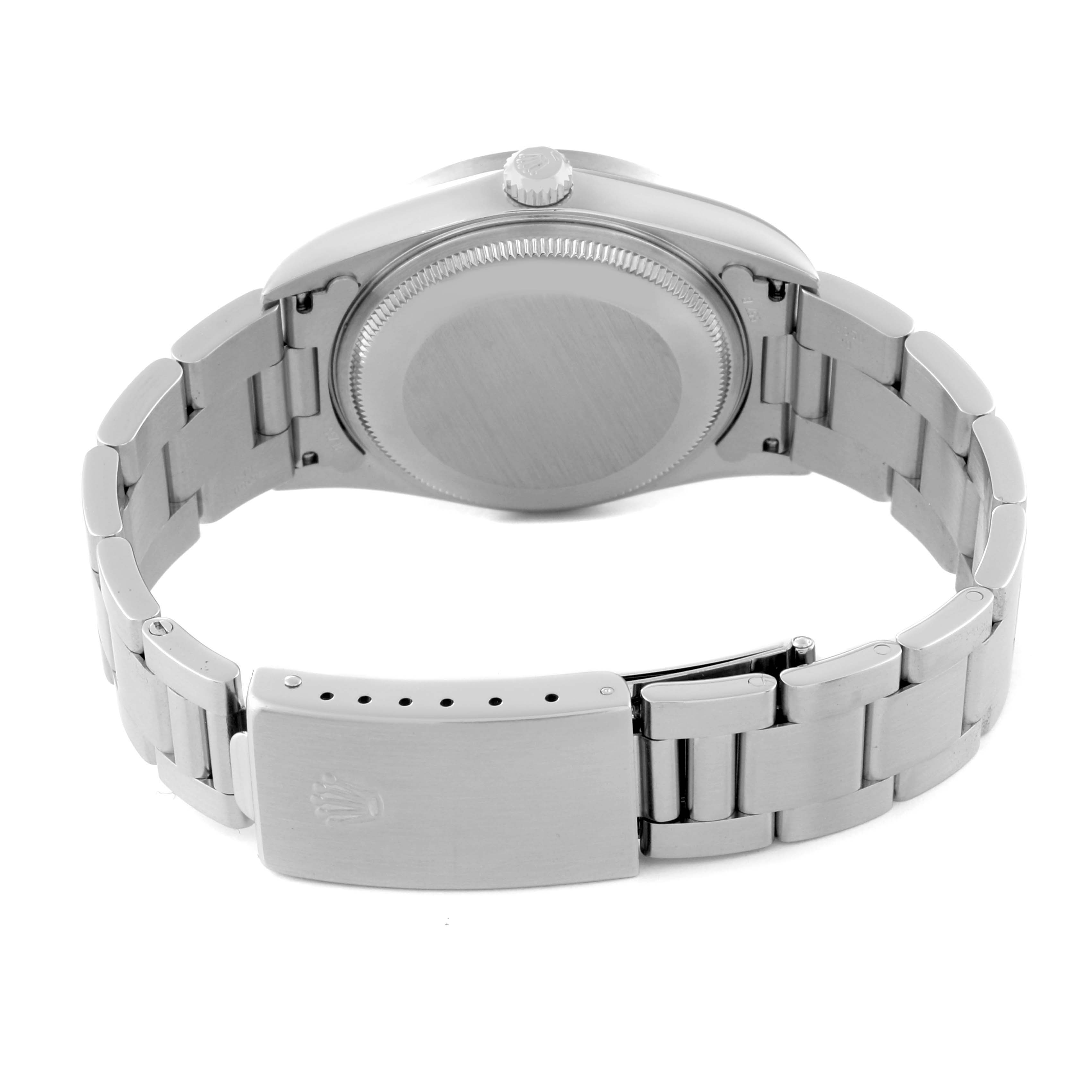 The image shows the back view of a Rolex Air-King 14010 Men's Stainless Steel Silver Dial 14010 Men's Stainless Steel Silver Dial watch, highlighting its case back and stainless steel bracelet with a clasp.