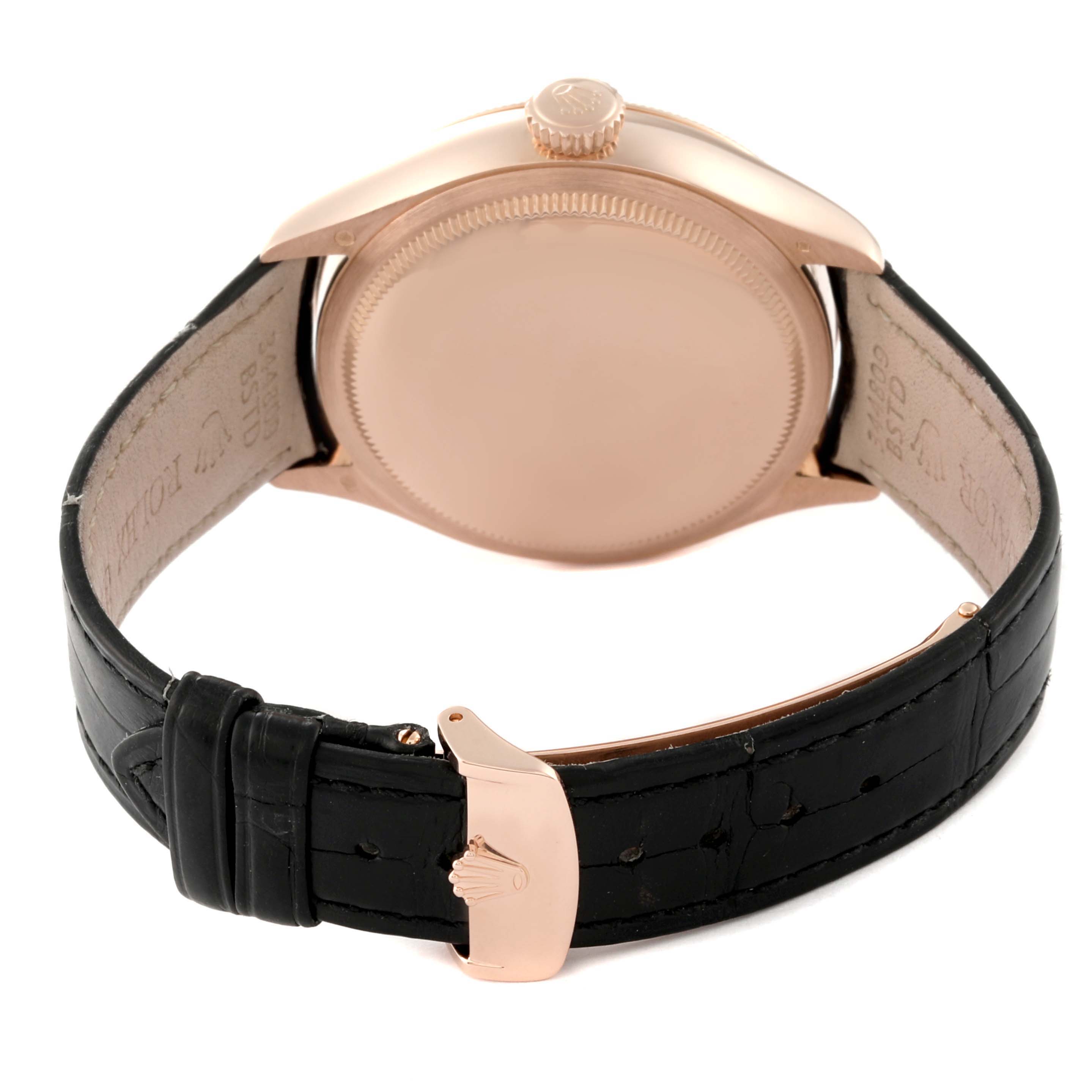 The image shows the back case, crown, and black leather strap of the Rolex Cellini 50535 Men's Rose Gold White Dial 50535 Men's Rose Gold White Dial watch.