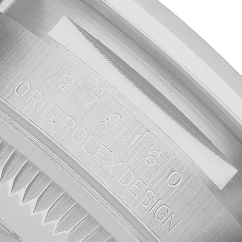 The image shows the side of a Rolex Datejust 279160 Women's Stainless Steel Silver Dial model, highlighting the case with engraved details.