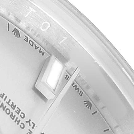 The image shows a close-up of the Datejust Rolex dial, focusing on the date window and partial text.