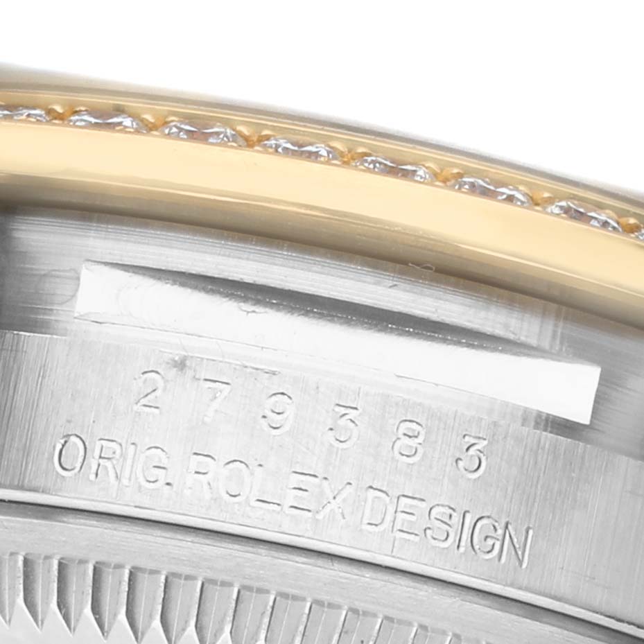The image shows a close-up of the serial number and "Orig. Rolex Design" engraving on the case back of a Rolex Datejust 279383 Women's Stainless Steel Silver Dial.