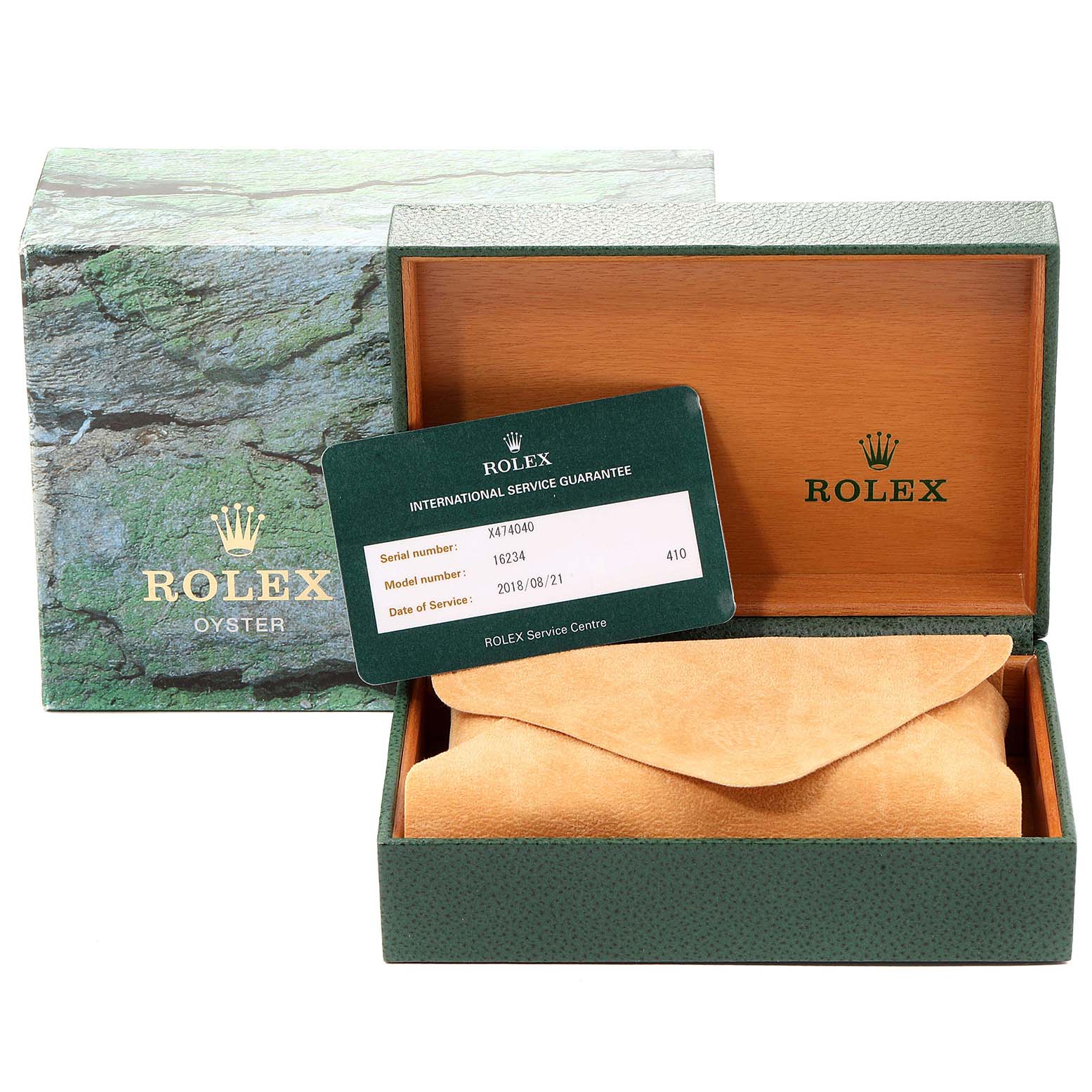 This image shows the Rolex Datejust 16234 Men's Stainless Steel Black Dial 16234 Men's Stainless Steel Black Dial watch box, a suede pouch, and an international service guarantee card.