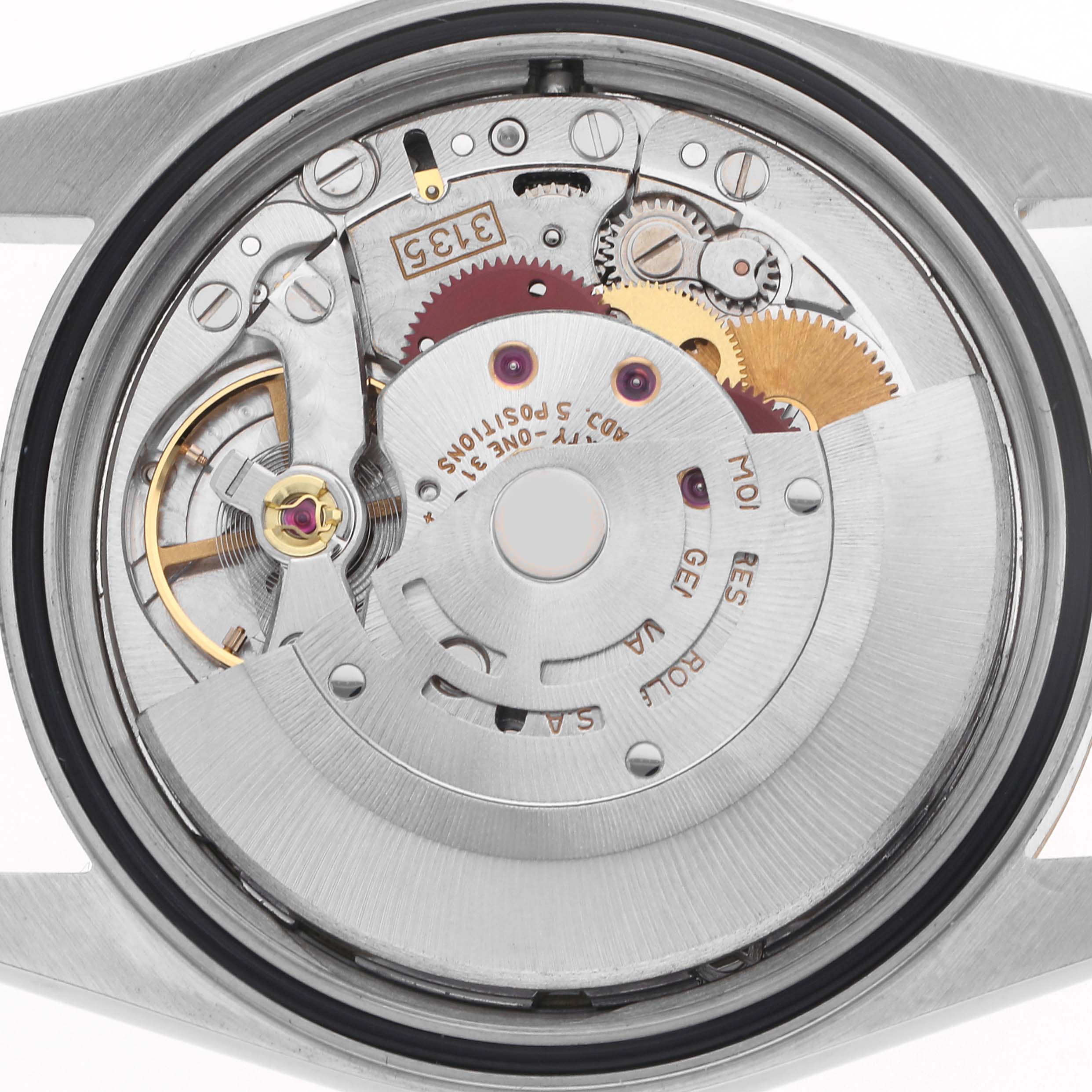 The image shows the internal movement of a Rolex Datejust 16233 Men
s Steel and Gold (two tone) Champagne Dial 16233 Men
s Steel and Gold (two tone) Champagne Dial watch, viewed from the rear with visible gears and components.