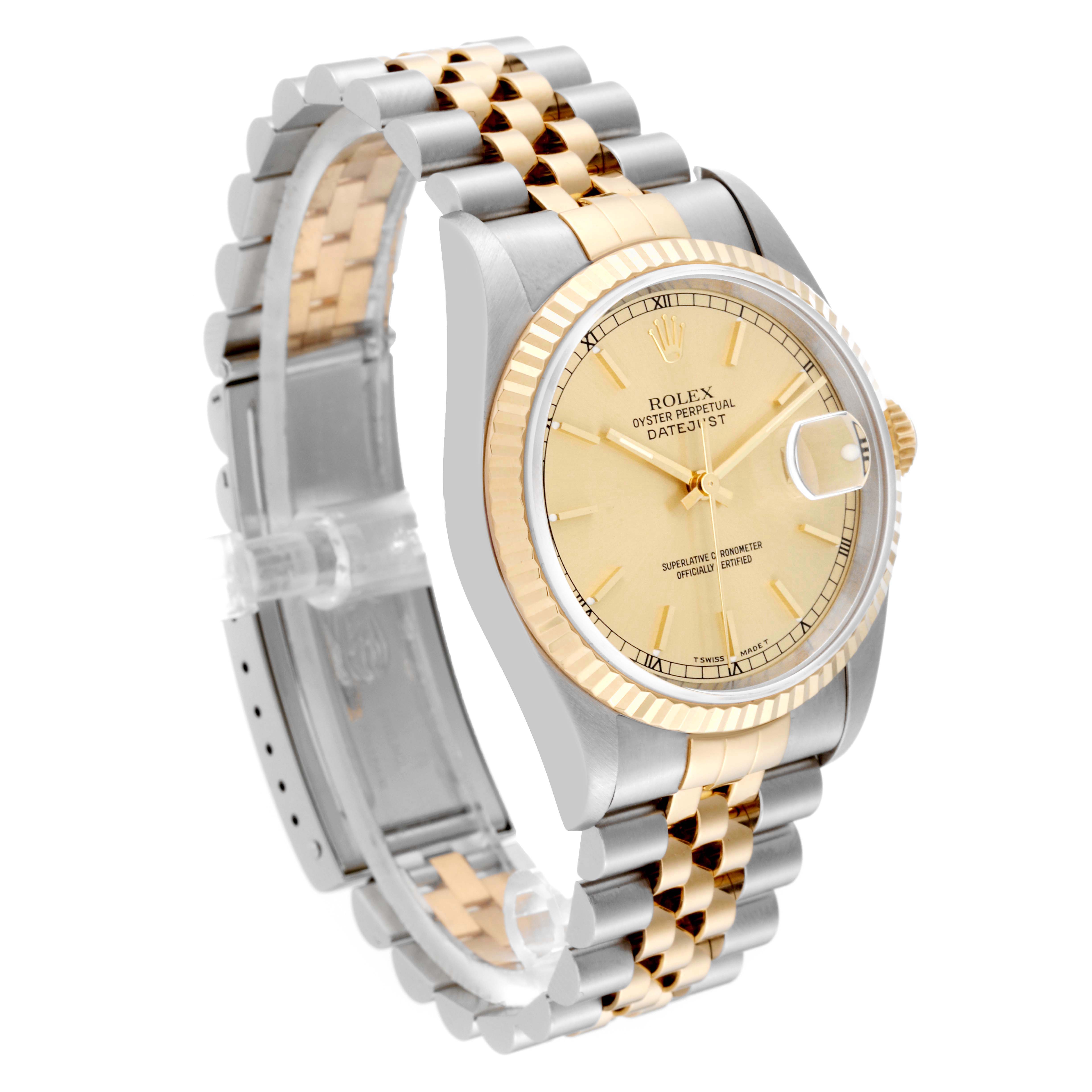 The Rolex Datejust 16233 Men's Steel and Gold (two tone) Champagne Dial 16233 Men's Steel and Gold (two tone) Champagne Dial watch is shown from a front-angle, displaying its gold dial, two-tone bracelet, fluted bezel, and date window.