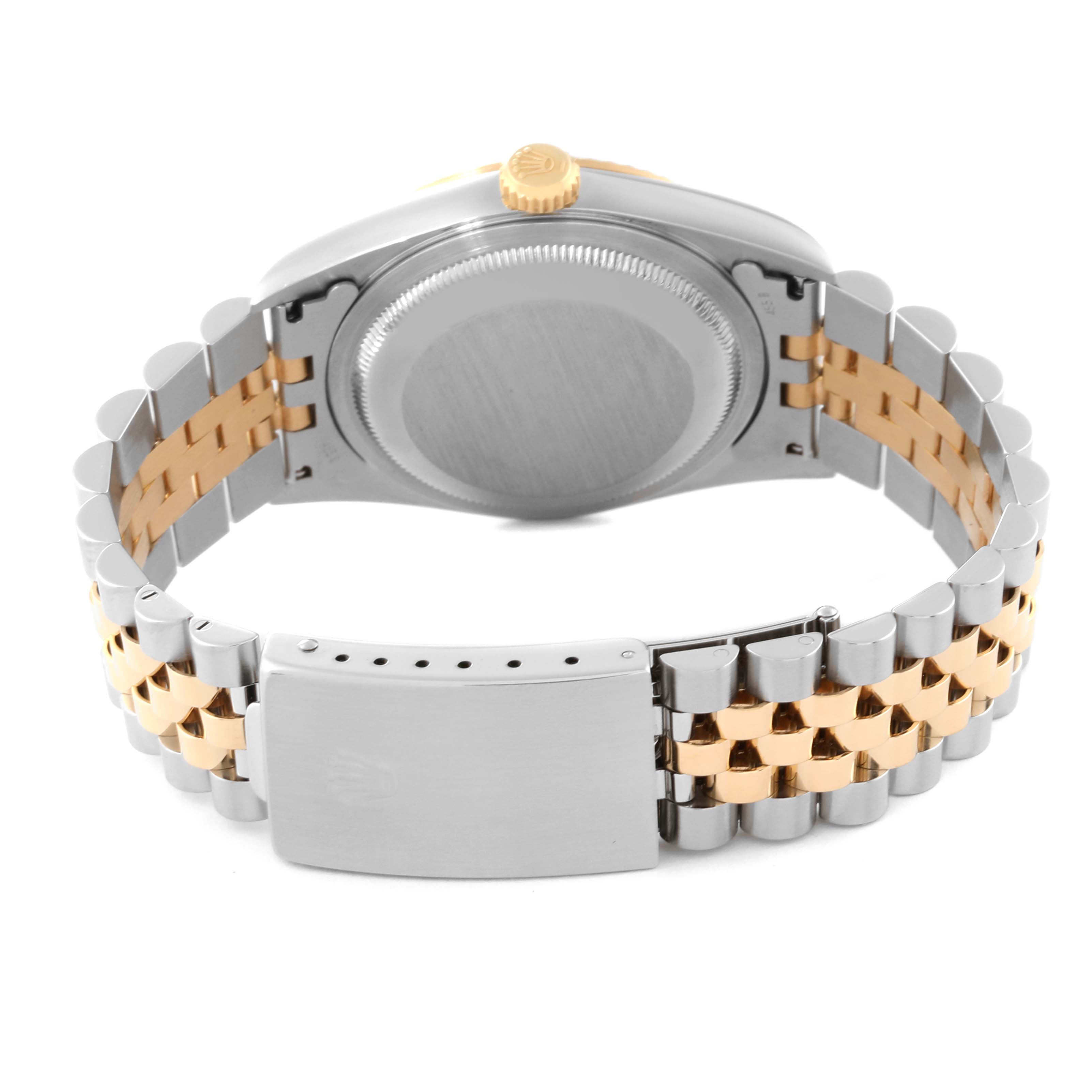 The image shows the backside of the Rolex Datejust 16233 Men's Steel and Gold (two tone) Champagne Dial 16233 Men's Steel and Gold (two tone) Champagne Dial model, focusing on the caseback and the two-tone bracelet with a clasp.