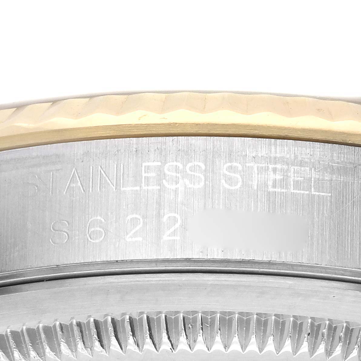 The image shows a close-up side view of the bezel and part of the case of a Rolex Datejust 16233 Men
s Steel and Gold (two tone) Champagne Dial 16233 Men
s Steel and Gold (two tone) Champagne Dial, highlighting the stainless steel.