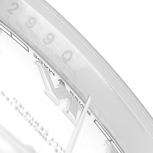The image shows a close-up of the dial and minute hand of the Rolex Datejust 41 126300 Men's Stainless Steel White Dial, focusing on the hour markers.