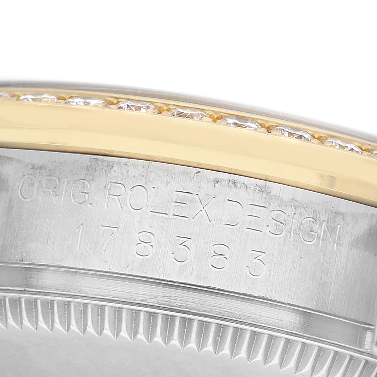 The image shows a close-up of the Rolex Datejust Midsize 31 model 178383, highlighting the bezel with diamonds and engraved details.