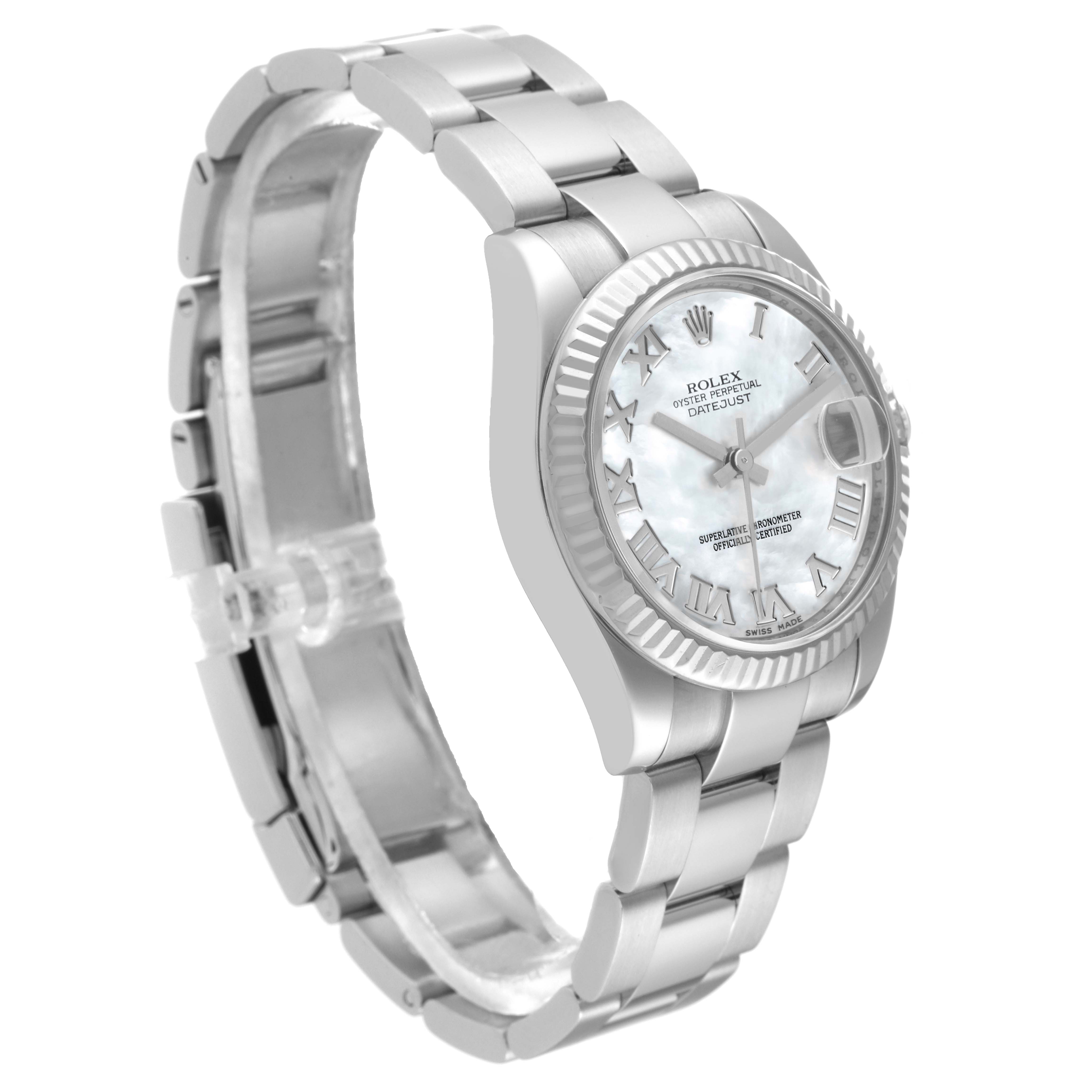The image shows a side angle of a Rolex Mid-Size 178274 Women
s Stainless Steel Mother of Pearl Dial 178274 Women
s Stainless Steel Mother of Pearl Dial Datejust watch, highlighting its bracelet, bezel, and dial.