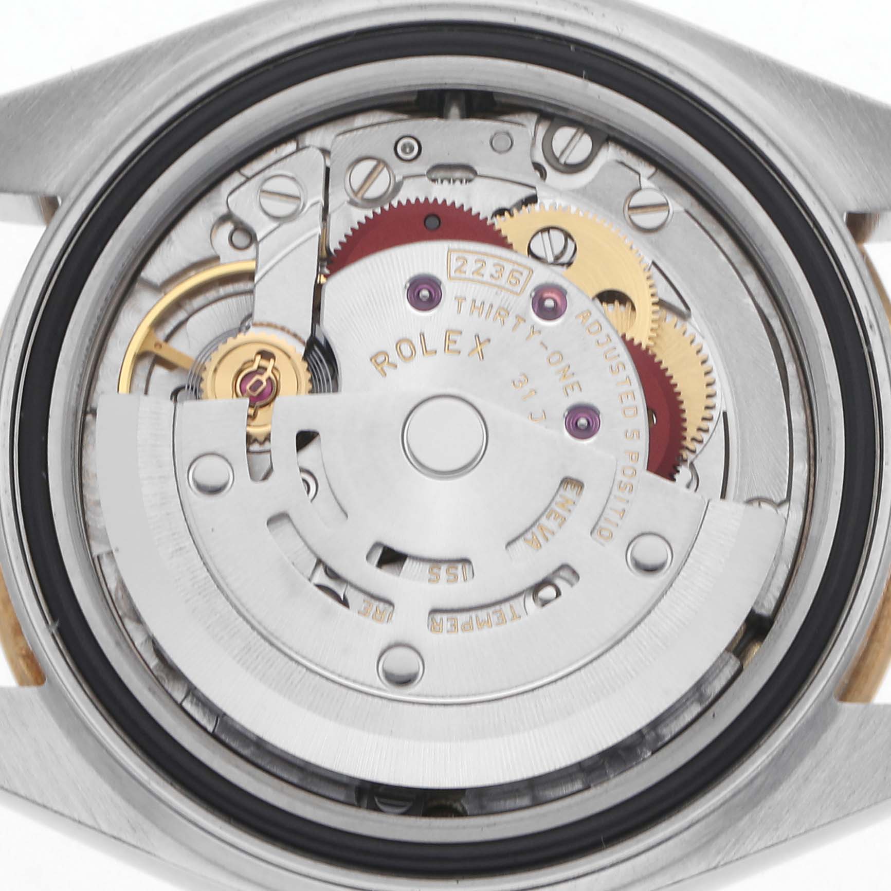 The image shows the movement of a Rolex Datejust 279163 Women
s Steel and Gold (two tone) Champagne Dial 279163 Women
s Steel and Gold (two tone) Champagne Dial watch, viewed from the back, displaying intricate mechanical parts.