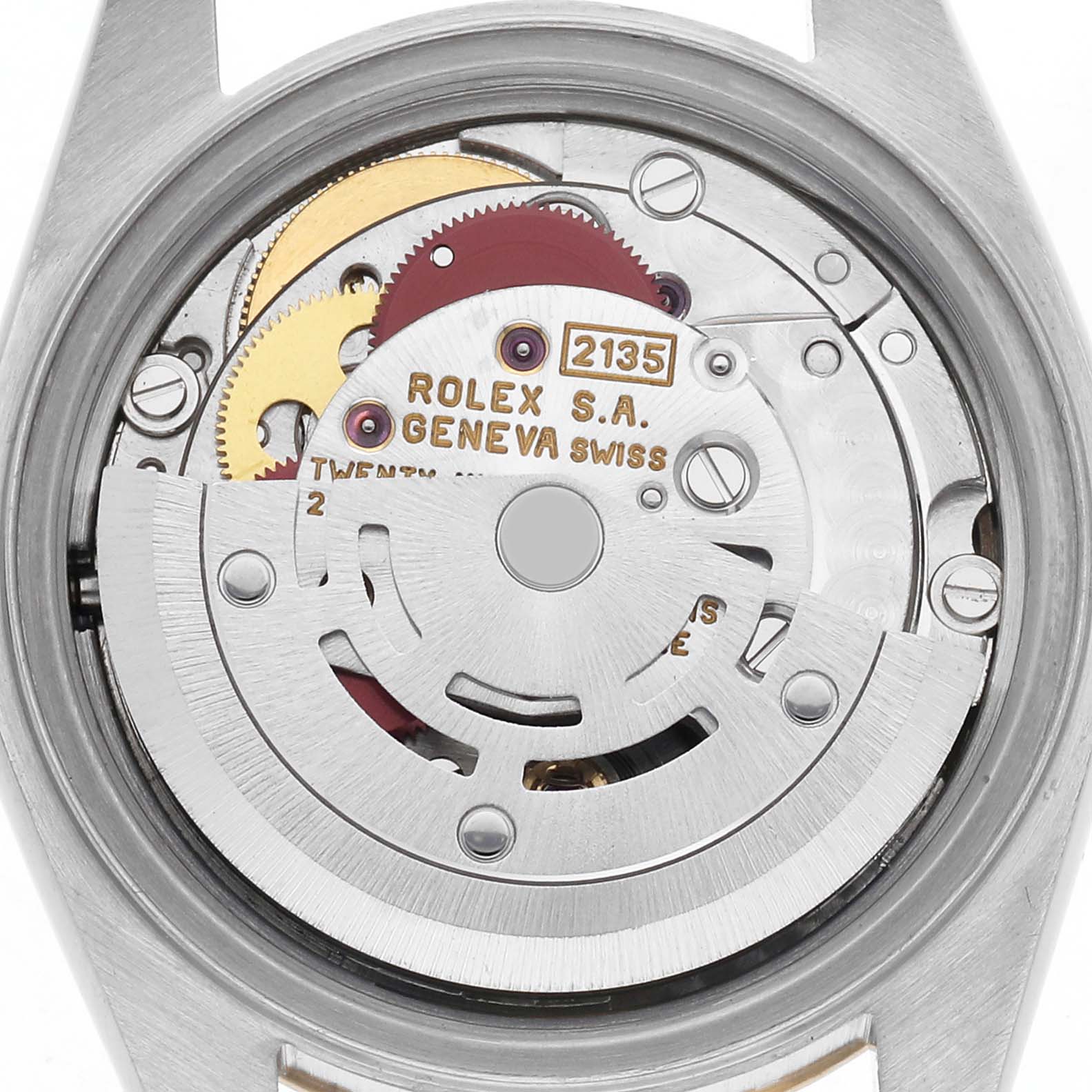 The image shows the movement of a Rolex Datejust 69173 Women's Steel and Gold (two tone) Champagne Dial 69173 Women's Steel and Gold (two tone) Champagne Dial watch from a top-down angle, highlighting the intricate gears and rotor.