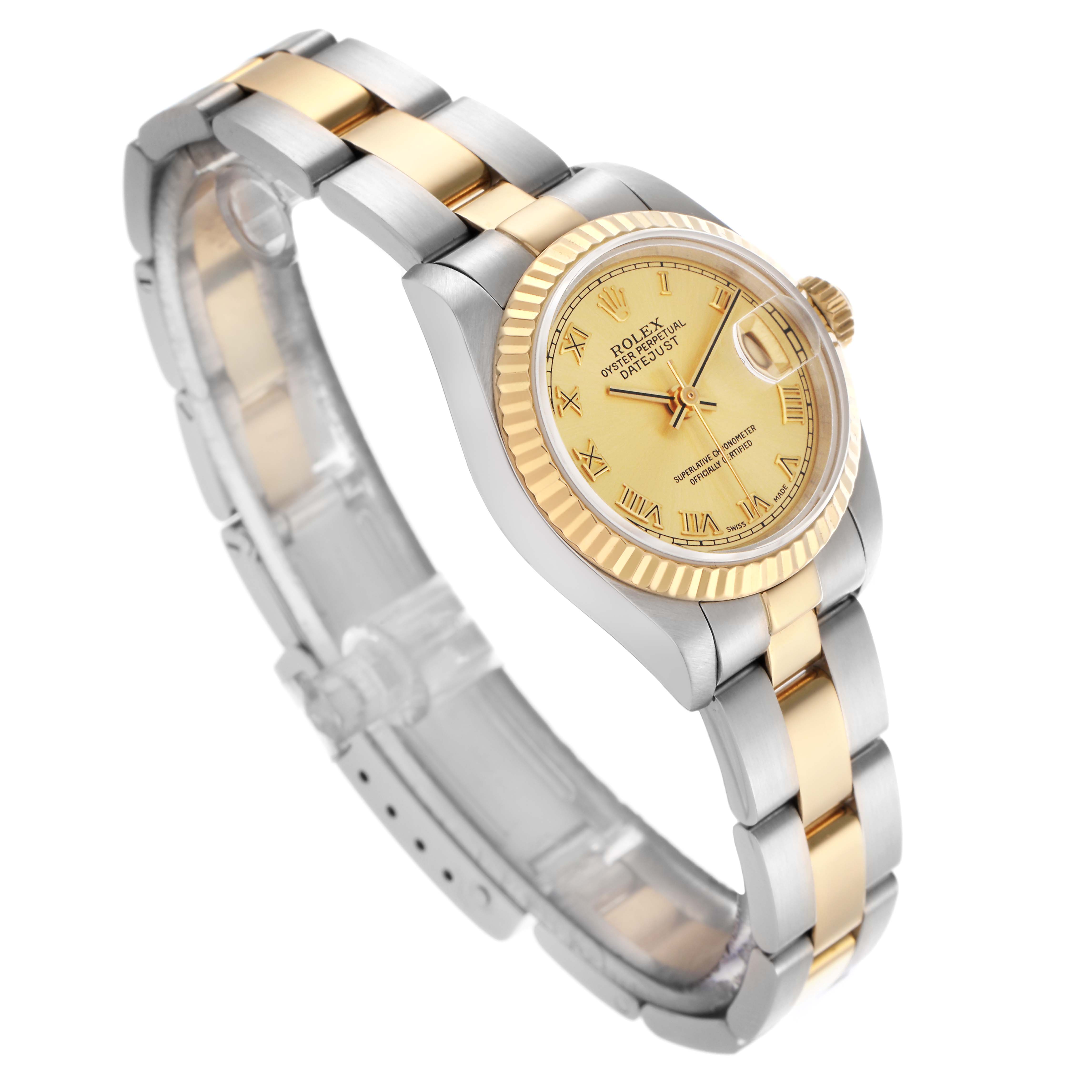 The image shows a Rolex Datejust 69173 Women's Steel and Gold (two tone) Champagne Dial 69173 Women's Steel and Gold (two tone) Champagne Dial watch angled diagonally, highlighting its gold dial, fluted bezel, and two-tone bracelet.