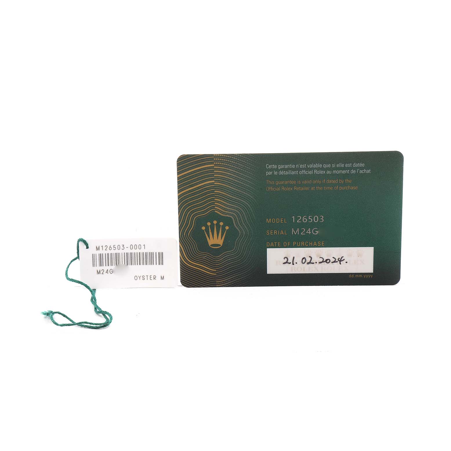 The image shows a Rolex Daytona 126503 Men's Steel and Gold (two tone) White Dial model warranty card and a tag from a straight-on angle.