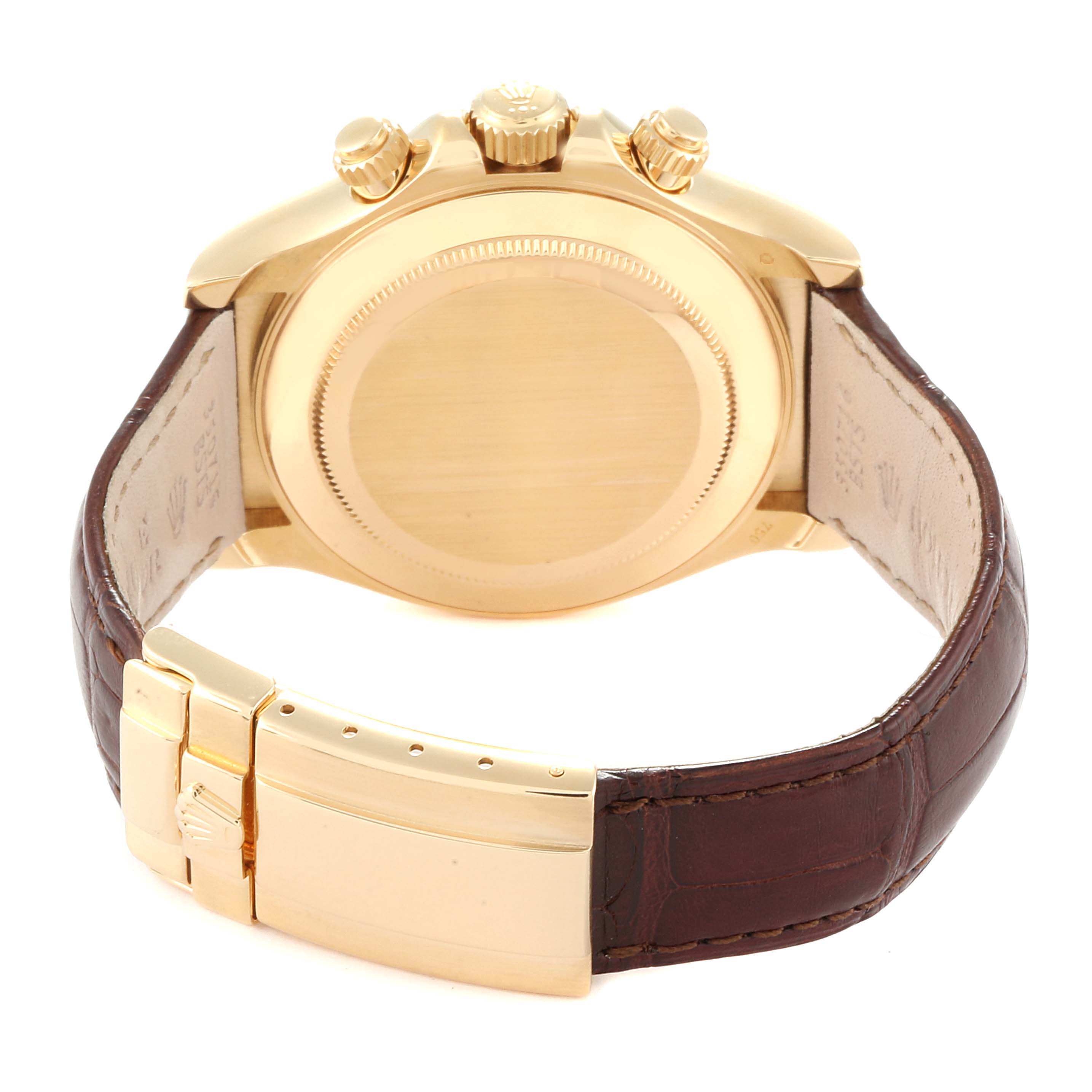 This image shows a Rolex Daytona 116518 Men's Yellow Gold Mother of Pearl Dial 116518 Men's Yellow Gold Mother of Pearl Dial watch from the back, highlighting the clasp, case back, and brown leather strap.