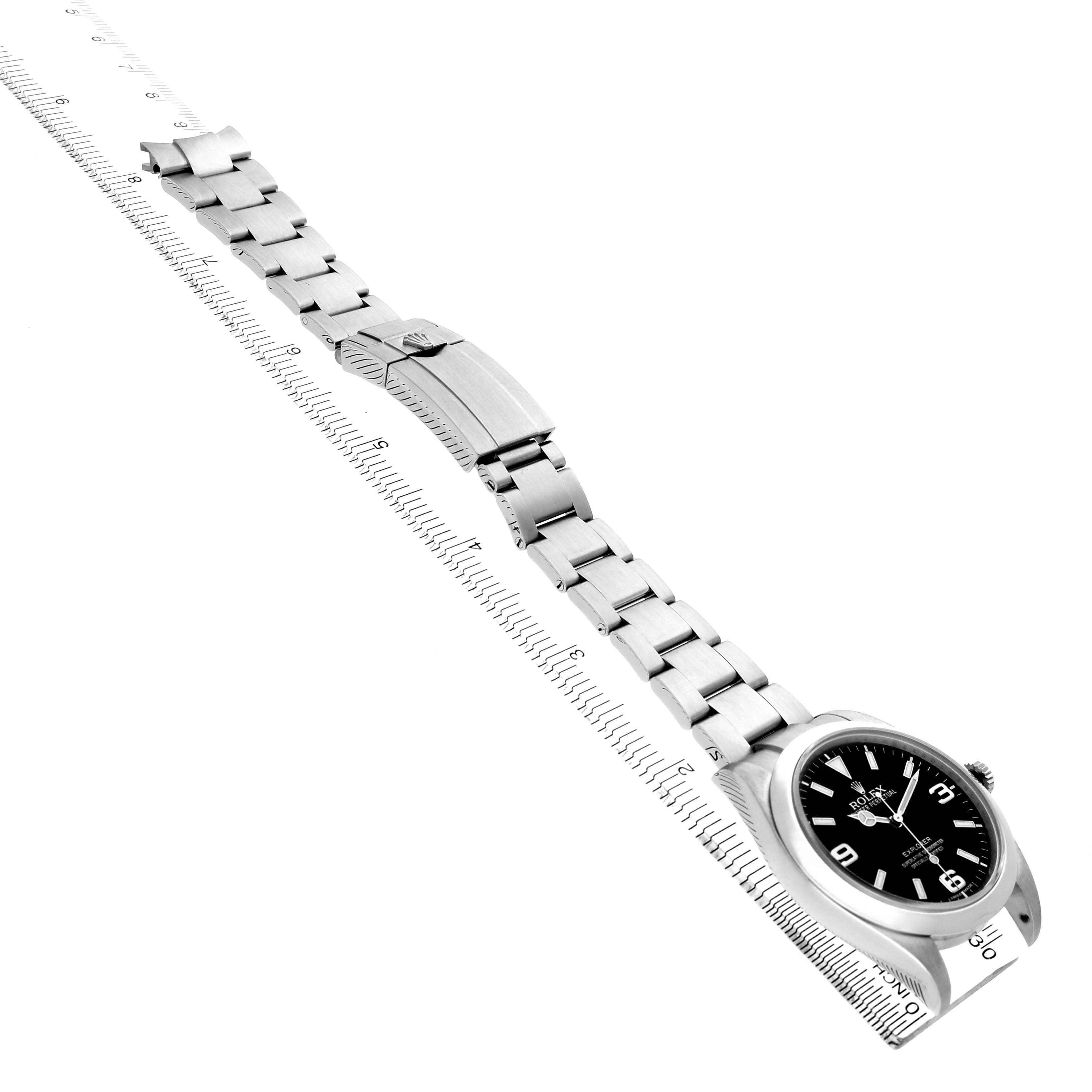 The Rolex Explorer 214270 Men's Stainless Steel Black Dial watch is shown at an angle highlighting the bracelet and clasp fully extended.