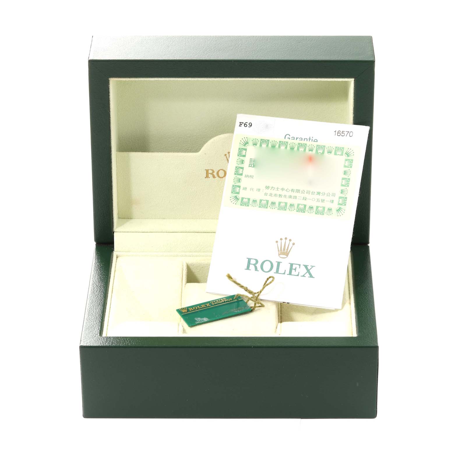 The image shows an open Rolex Explorer 16570 Men
s Stainless Steel Black Dial 16570 Men
s Stainless Steel Black Dial watch box with documents and a tag inside, viewed from the front.