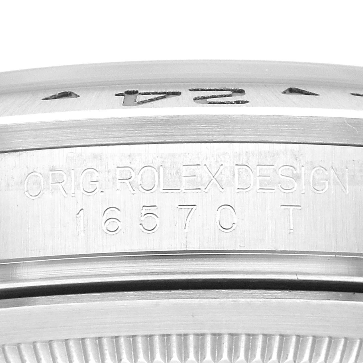 Close-up of the side of a Rolex Explorer 16570 Men's Stainless Steel White Dial 16570 Men's Stainless Steel White Dial watch showing the engraved design serial number "16570 T."