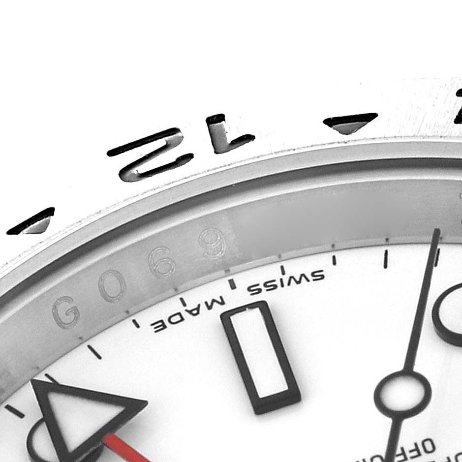 The image shows a close-up of the dial, bezel, and part of the minute and second hands of a Rolex Explorer 16570 Men's Stainless Steel White Dial 16570 Men's Stainless Steel White Dial watch.