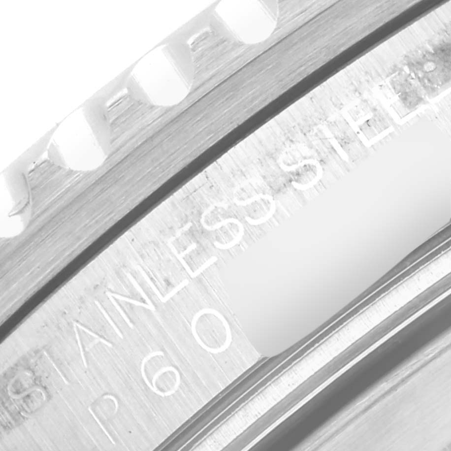 This close-up image shows the stainless steel case with engraving on a Rolex GMT-Master 16710 Men
s Stainless Steel Black Dial 16710 Men
s Stainless Steel Black Dial watch.