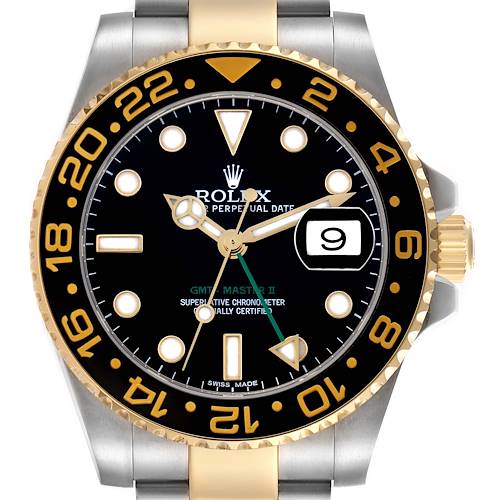 The Rolex GMT-Master watch is shown from the front, highlighting the bezel, dial, and hands.