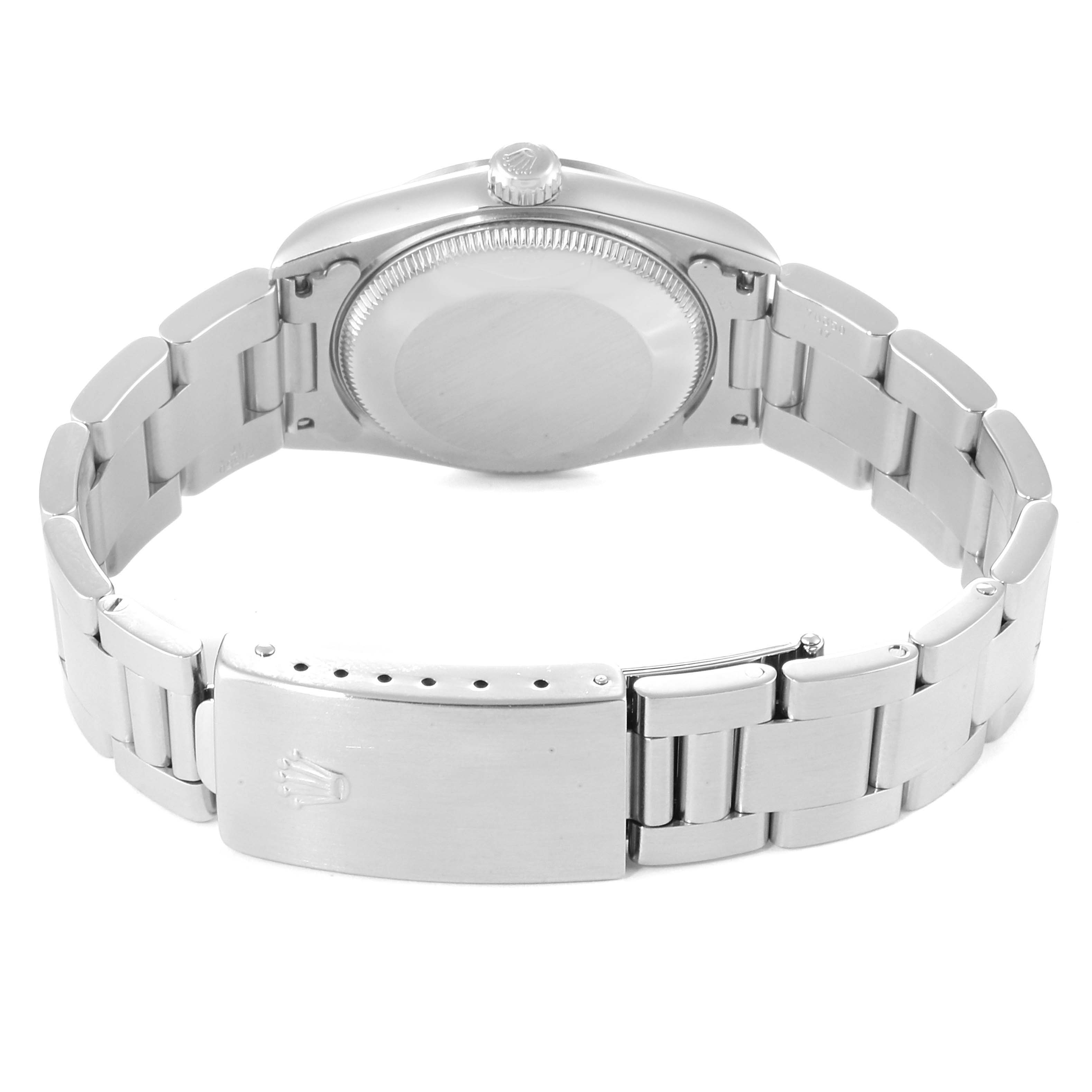 This is a rear view of a Mid-Size Rolex watch, showing the closed case back and metal bracelet clasp.