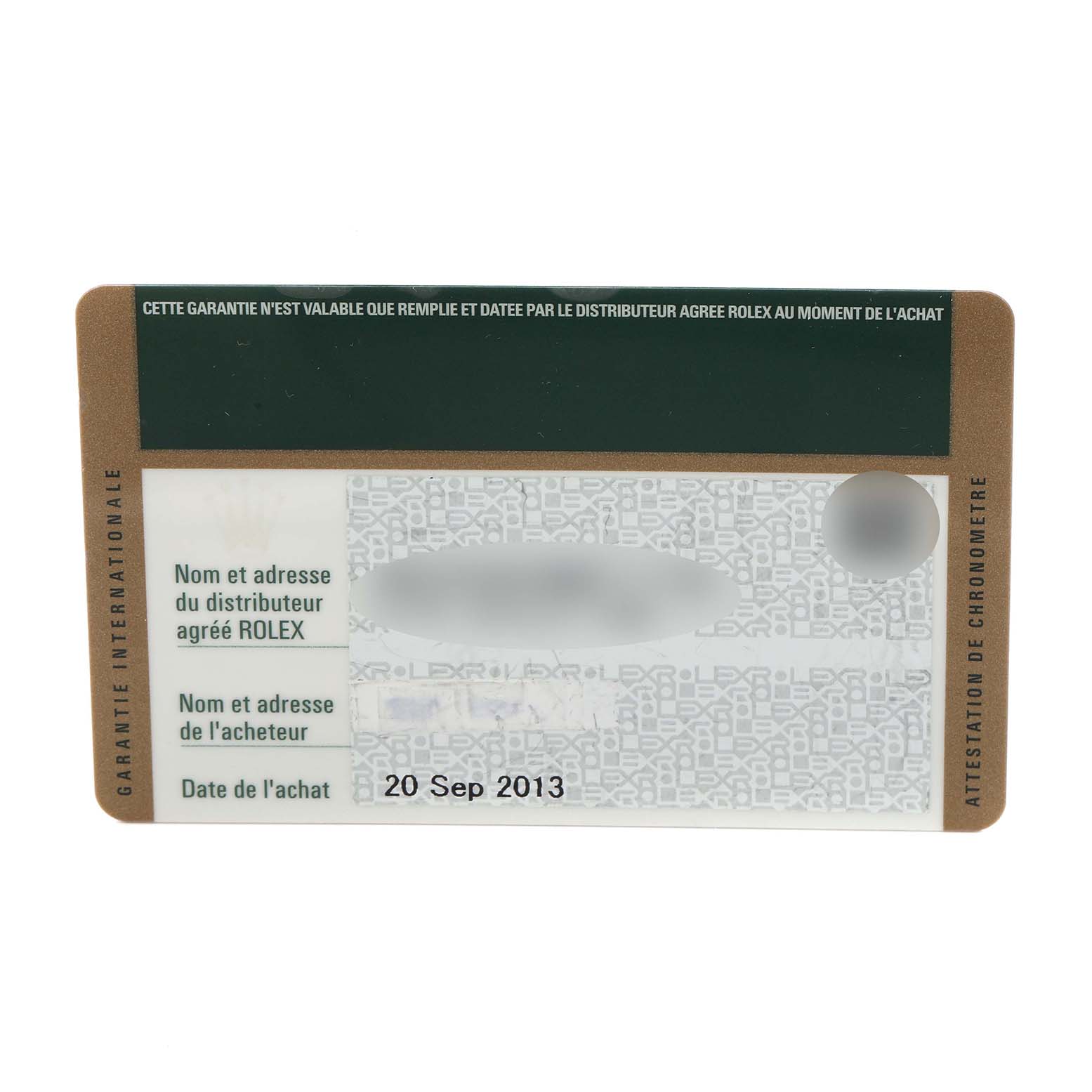 The image shows the guarantee card for a Rolex Milgauss 116400 Men
s Stainless Steel Black Dial 116400 Men
s Stainless Steel Black Dial, not the watch itself.