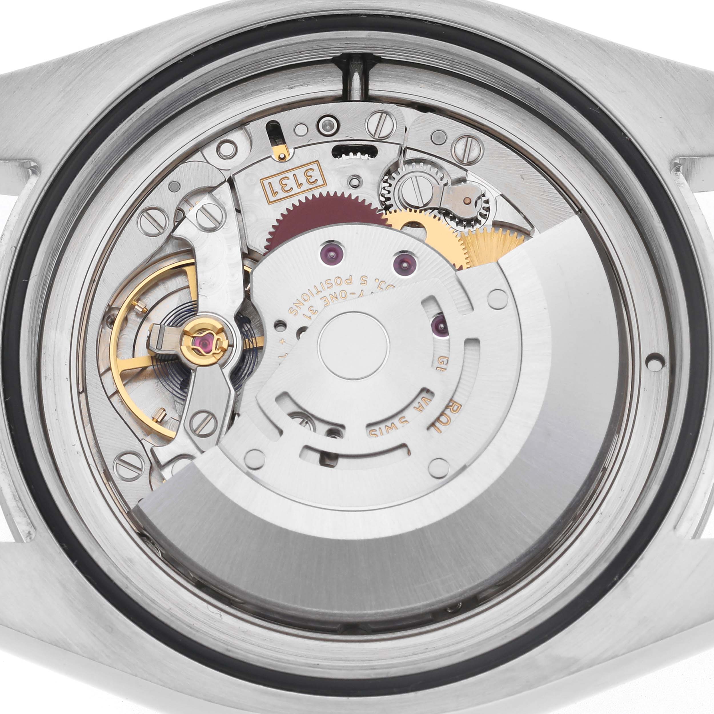 The image shows the back view of a Rolex Milgauss 116400 Men
s Stainless Steel Black Dial 116400 Men
s Stainless Steel Black Dial watch, highlighting its intricate movement components.