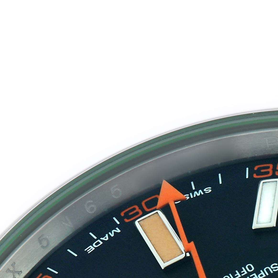 The image shows a close-up of the Rolex Milgauss 116400 Men
s Stainless Steel Black Dial 116400 Men
s Stainless Steel Black Dial watch face, highlighting the orange seconds hand and hour markers.
