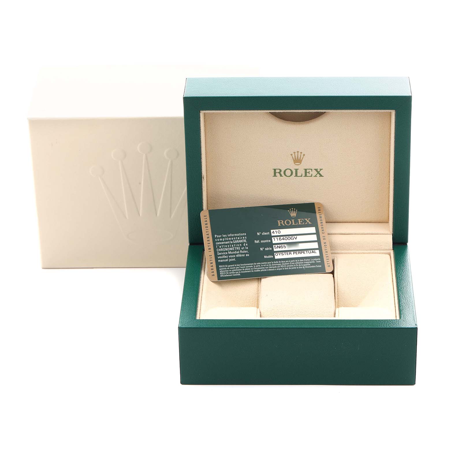 The image shows a Rolex Milgauss 116400 Men
s Stainless Steel Black Dial 116400 Men
s Stainless Steel Black Dial watch box at an angle, displaying the inner compartment and an identification card.