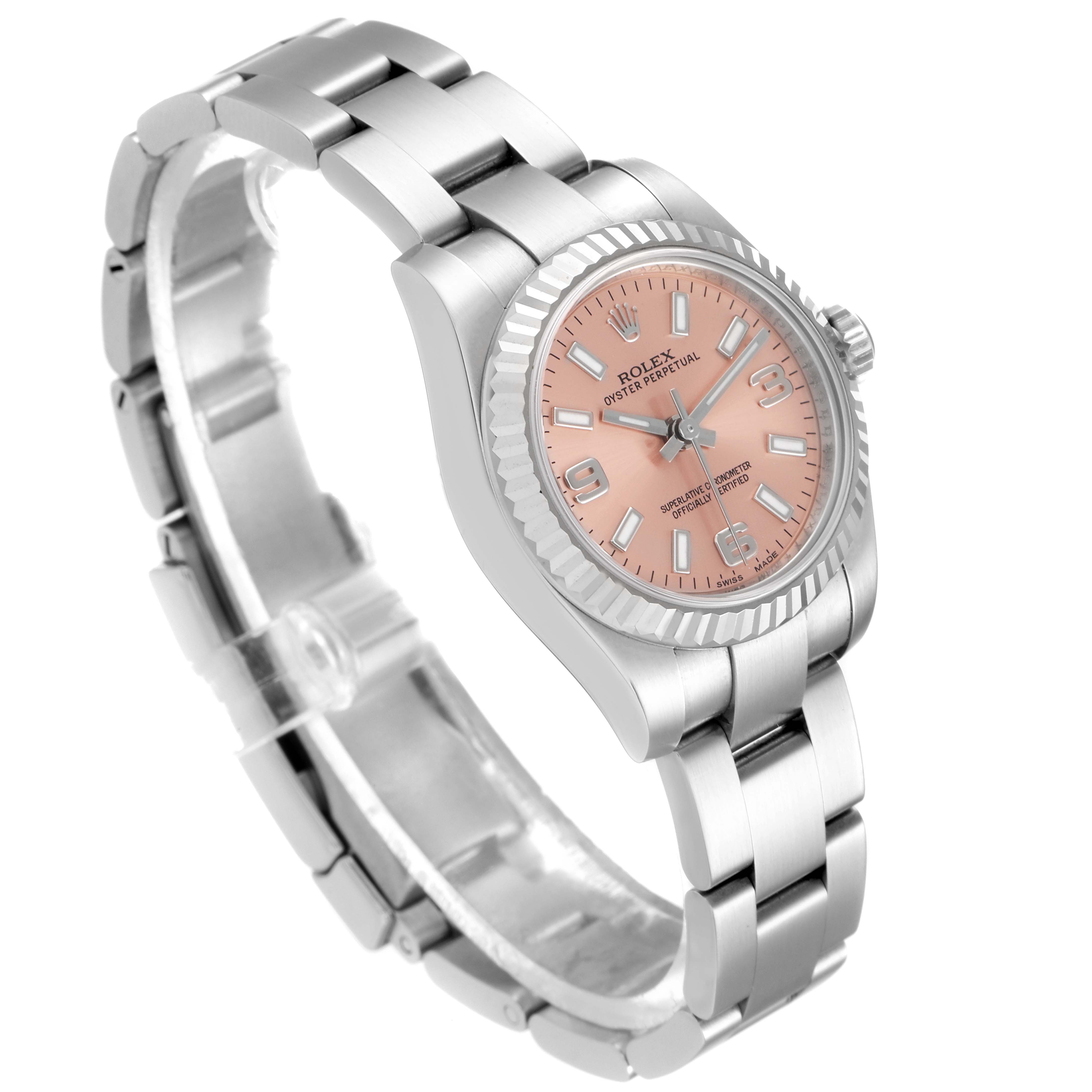 The Rolex Datejust 176234 Women's Stainless Steel Pink Dial 176234 Women's Stainless Steel Pink Dial watch is shown at a three-quarter angle, highlighting its pink dial, fluted bezel, and stainless steel bracelet.