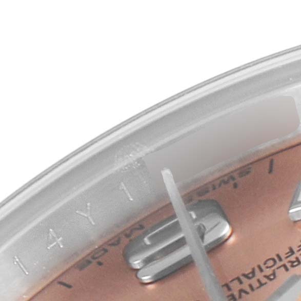 This close-up of a Rolex Datejust 176234 Women's Stainless Steel Pink Dial 176234 Women's Stainless Steel Pink Dial shows a partial view of the dial, including the indices and second hand.