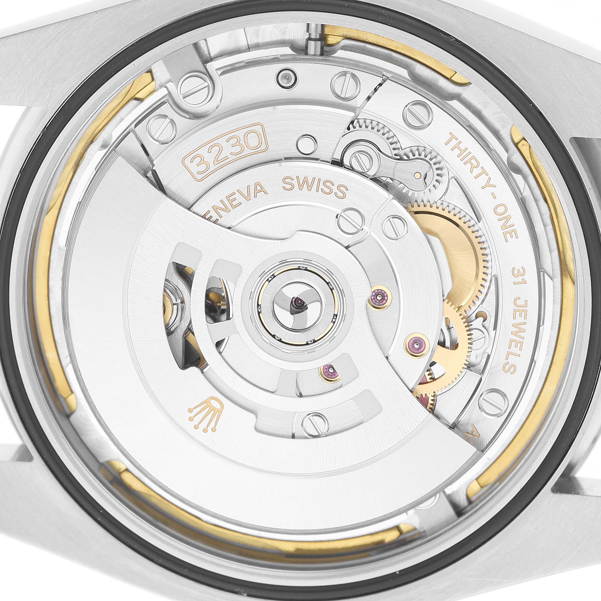 The image shows the back view of a Rolex Oyster Perpetual 124300-0005 Men's Stainless Steel Green Dial, revealing its 3230 movement mechanism and intricate details.