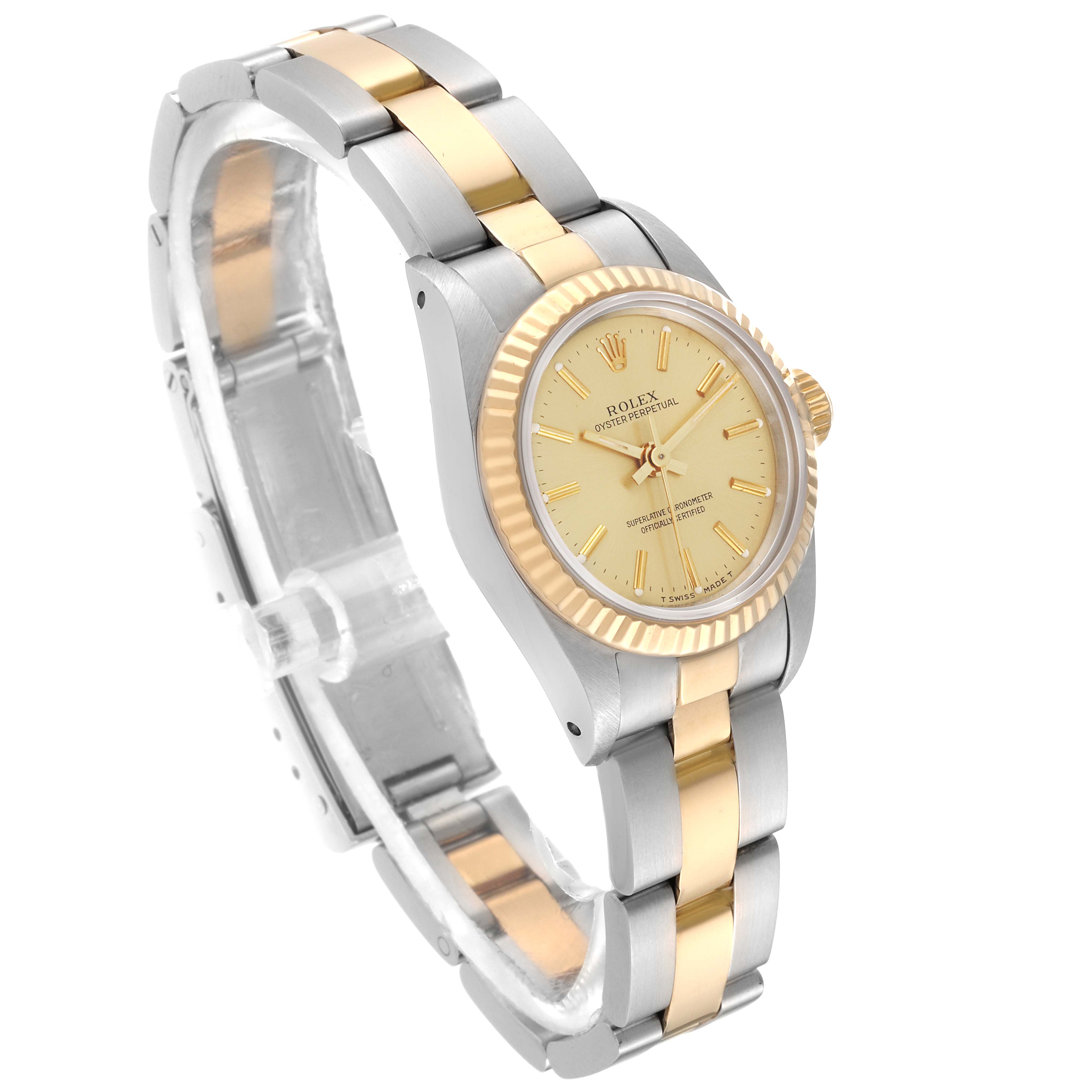 The Rolex Oyster Perpetual 67193 Women's Steel and Gold (two tone) Champagne Dial 67193 Women's Steel and Gold (two tone) Champagne Dial watch is shown at an angled side view, displaying the gold and silver bezel, dial, and bracelet.