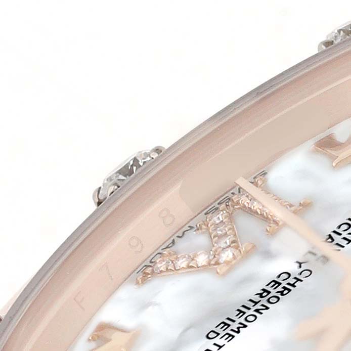 The image shows a close-up of the bezel and part of the dial of a Rolex Pearlmaster 81315 Women's Rose Gold Mother of Pearl Dial watch, highlighting diamond details.