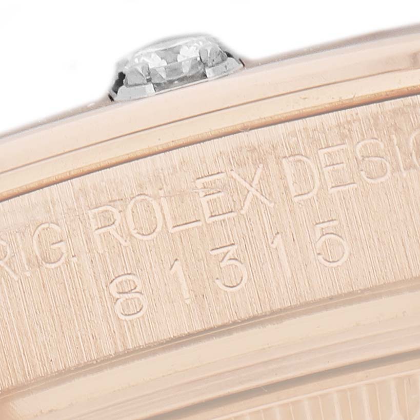 The image shows a close-up of the case side with engravings on a Rolex Pearlmaster 81315 Women's Rose Gold Mother of Pearl Dial watch.
