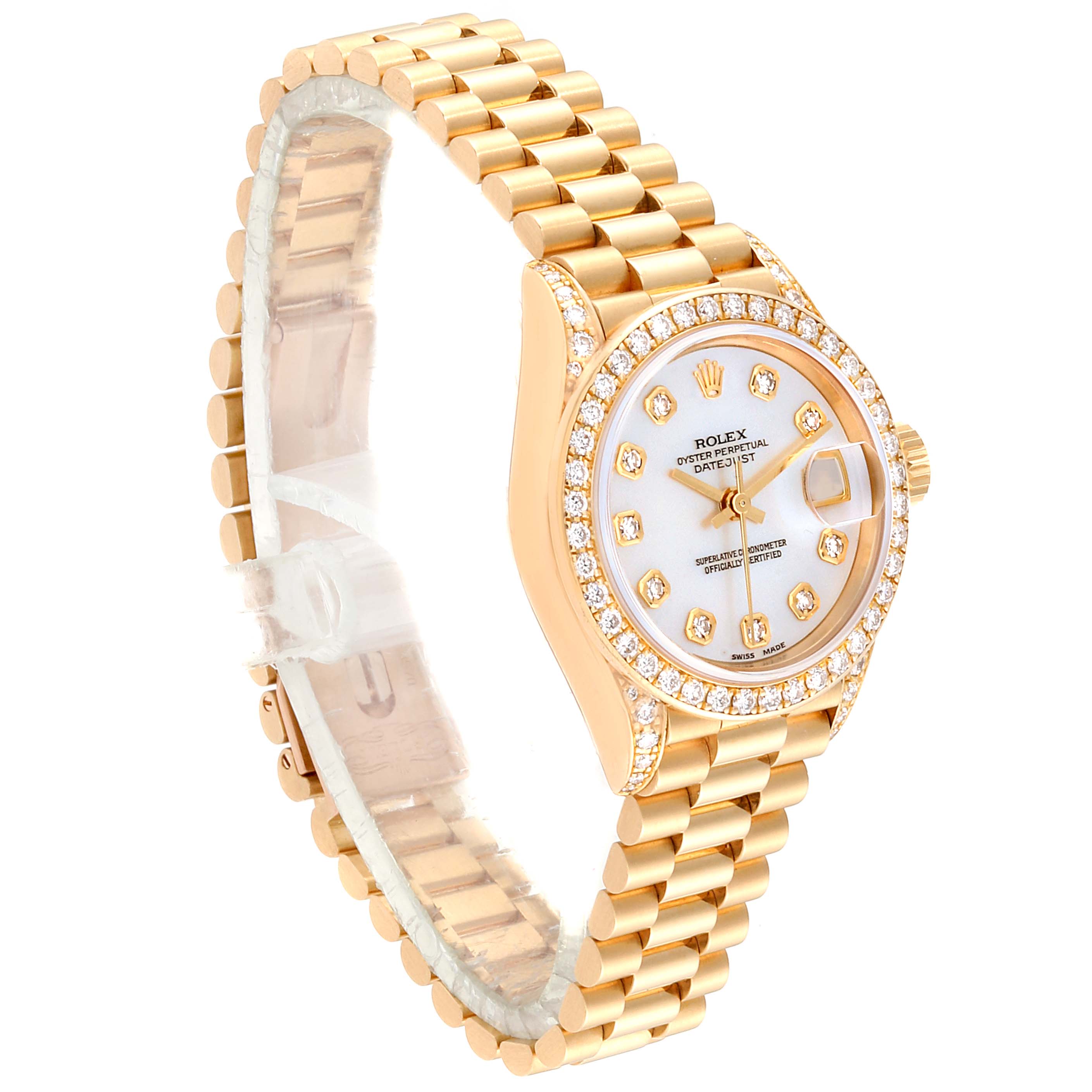 The image shows a Rolex President 69158 Women
s Yellow Gold Mother of Pearl Dial 69158 Women
s Yellow Gold Mother of Pearl Dial model watch at a three-quarter angle, displaying its bracelet, face, and diamond bezel.