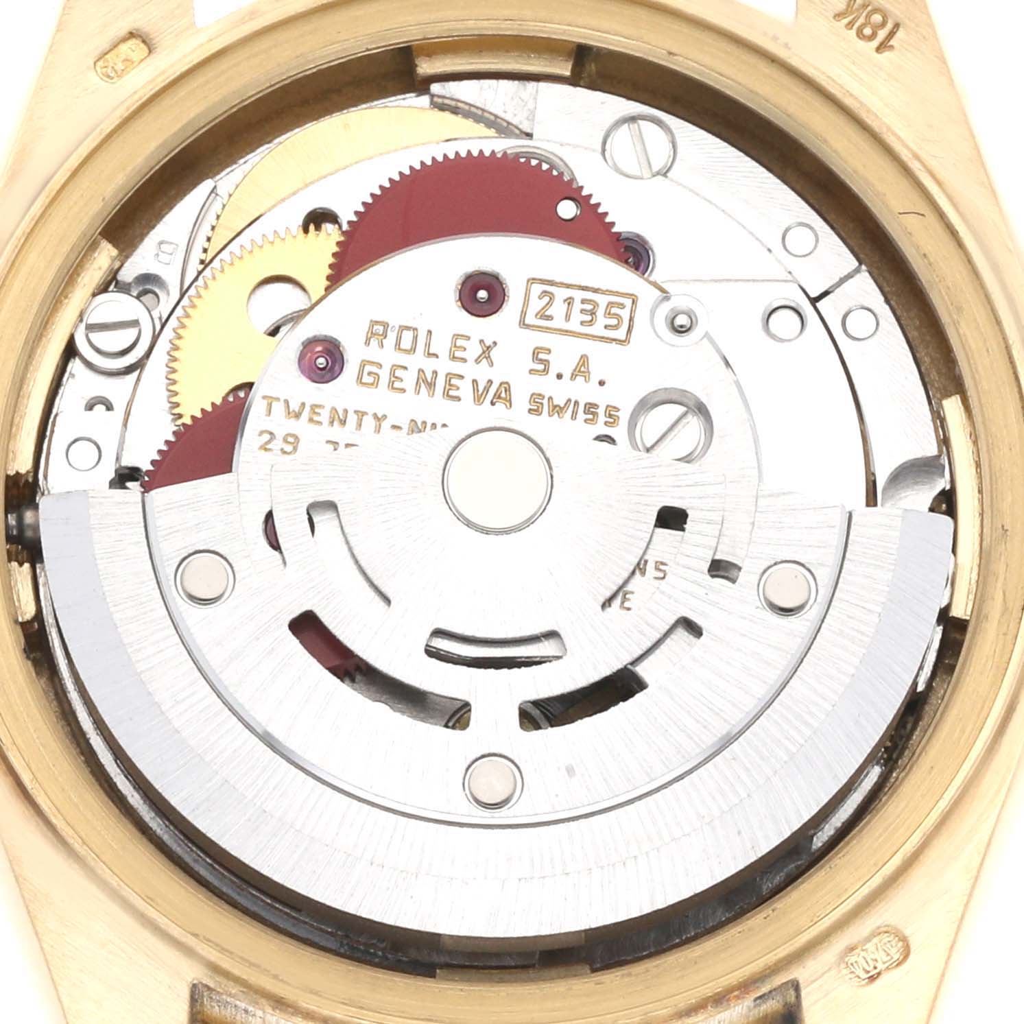 This is an internal view of the Rolex President 69138G Women
s Yellow Gold Champagne Dial 69138G Women
s Yellow Gold Champagne Dial model, showing its movement mechanism and gears.