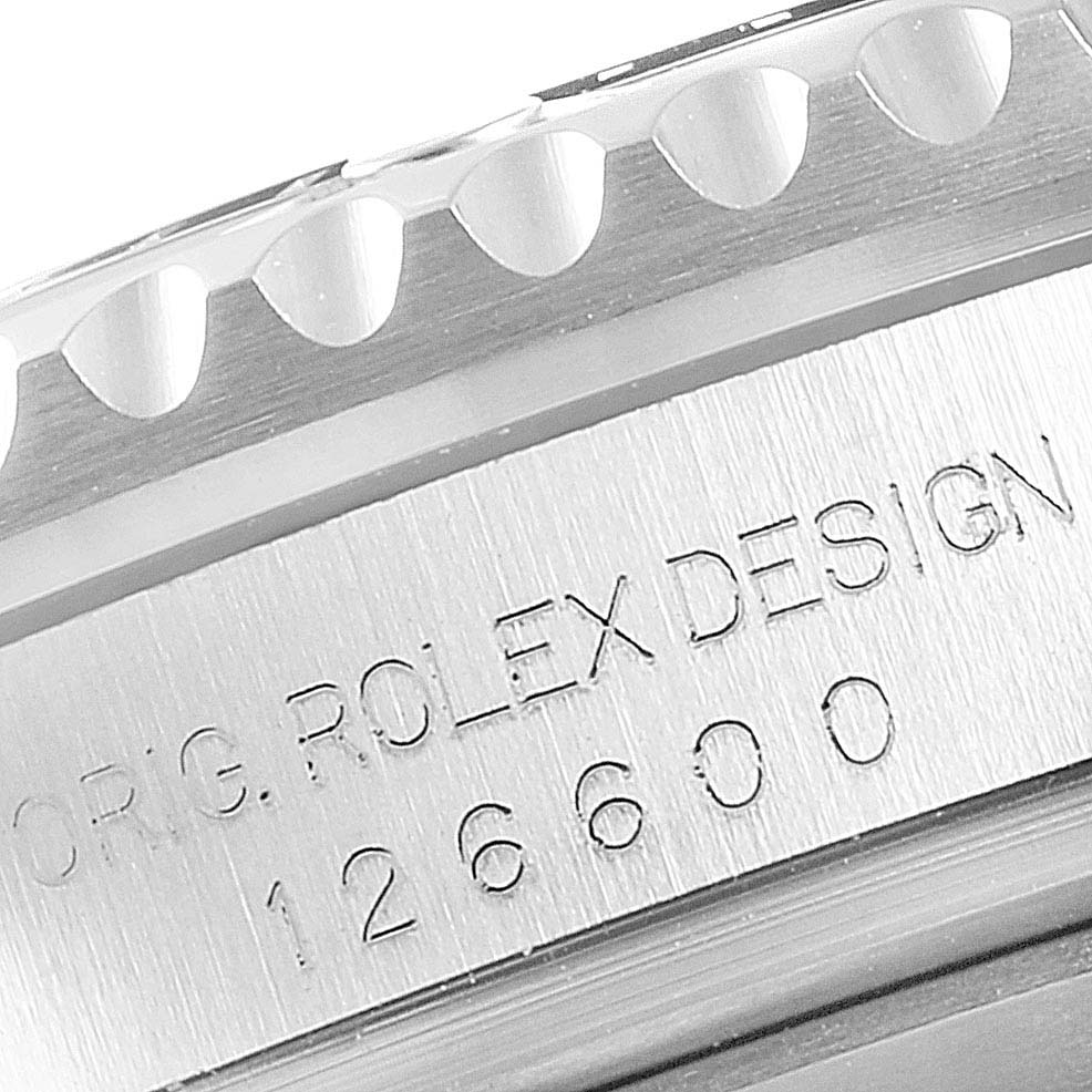 This image shows a close-up of the edge and side of the Rolex Sea-Dweller 126600 Men
s Stainless Steel Black Dial 126600 Men
s Stainless Steel Black Dial watch, highlighting the model and design engraving.