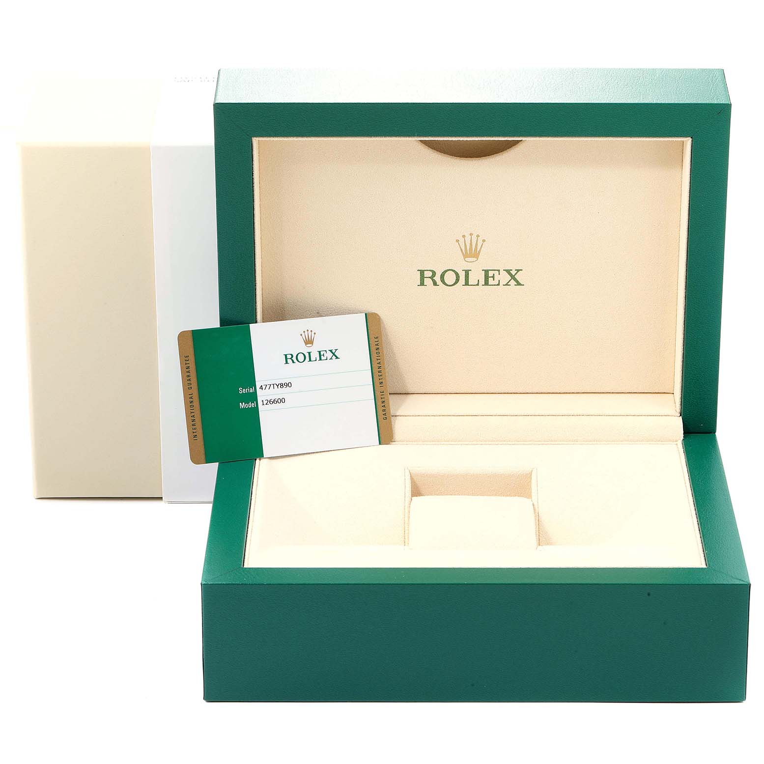 The image shows an open green Rolex box with a display card for the Sea-Dweller model and the brand
s logo inside.